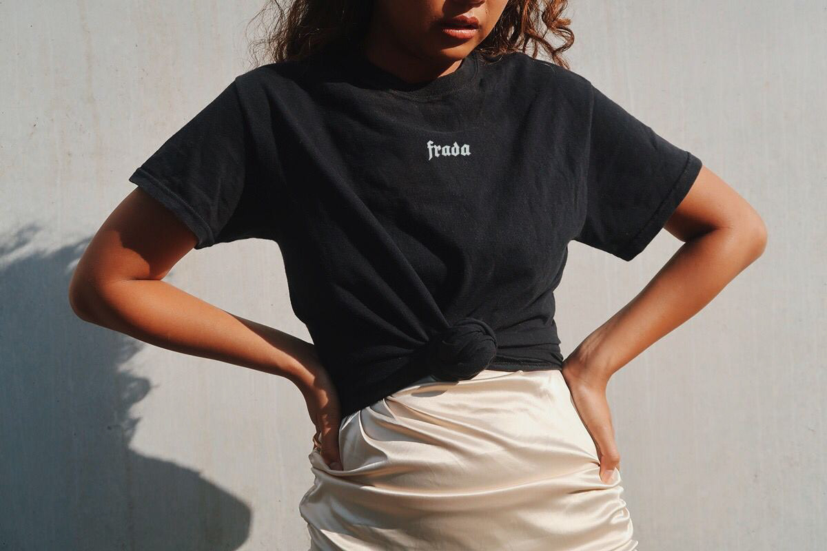 Back of the premium t-shirt worn by Cca (Putri Gusti)