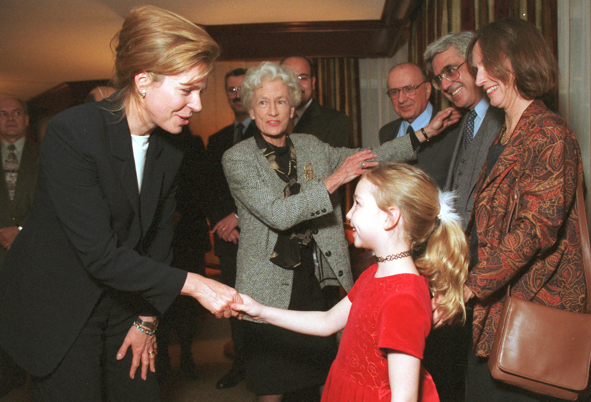 Queen Noor of Jordan meets a fan. March 2000.