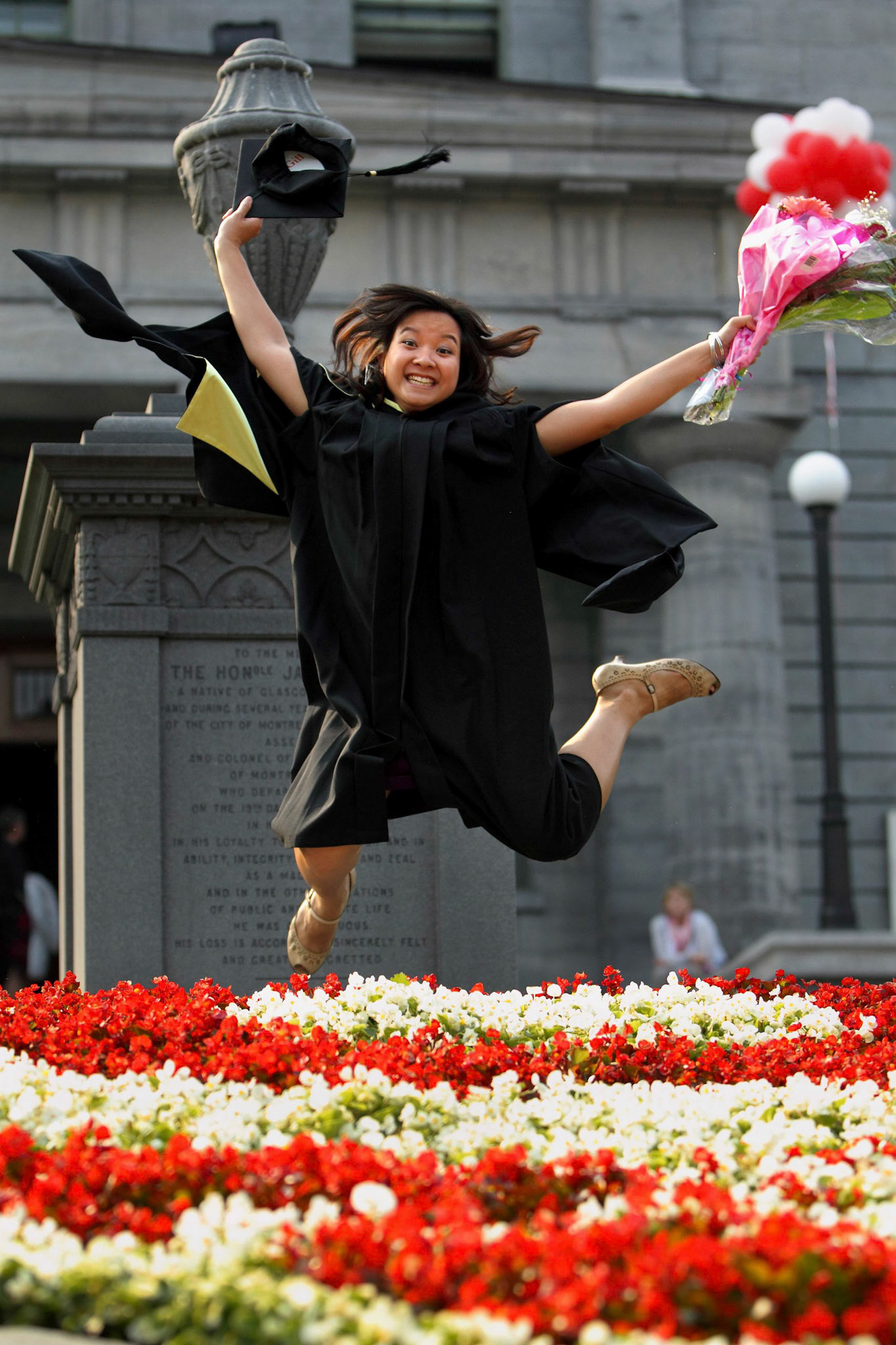 Thao Nguyen is off-the-ground happy.  She got her B.Sc. in Biology May 31, 2010.  