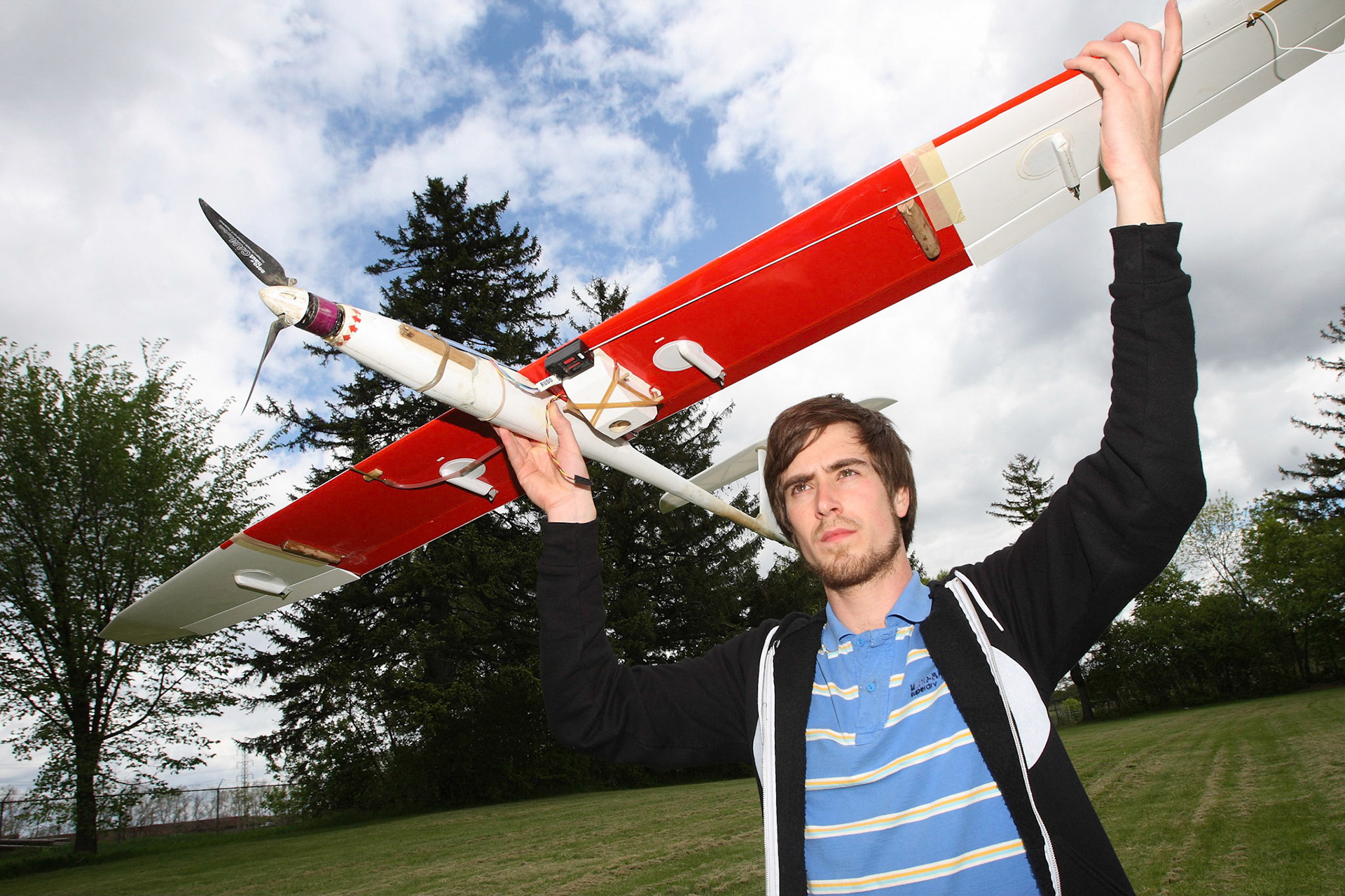 Dominique Chabot launches a UAV (unmanned aerial vehicle) as part of a habitat-mapping project started by David Bird, Director of McGill's Avian Science and Conservation Centre. May 2008.