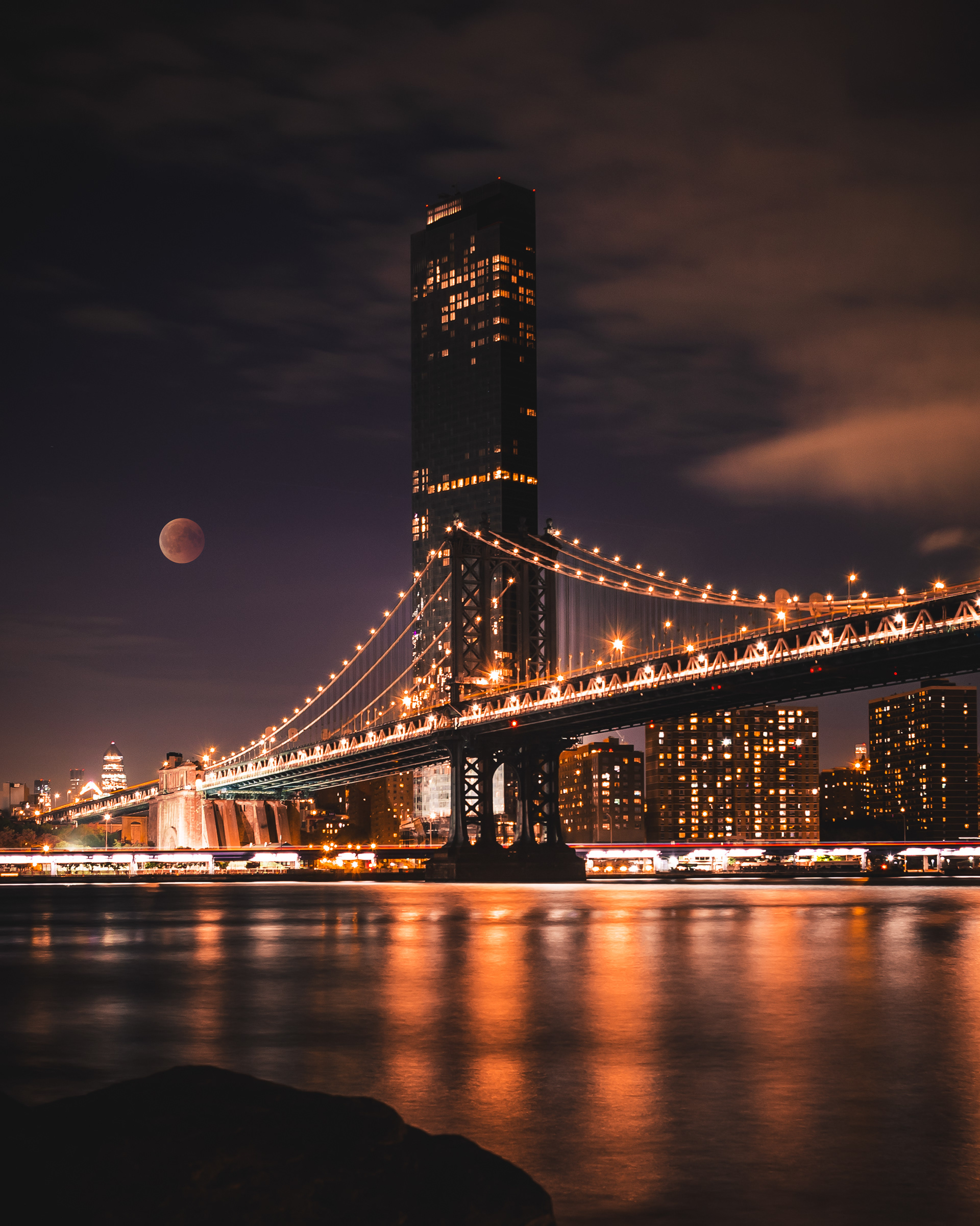 a Full moon over manhattan bridge
