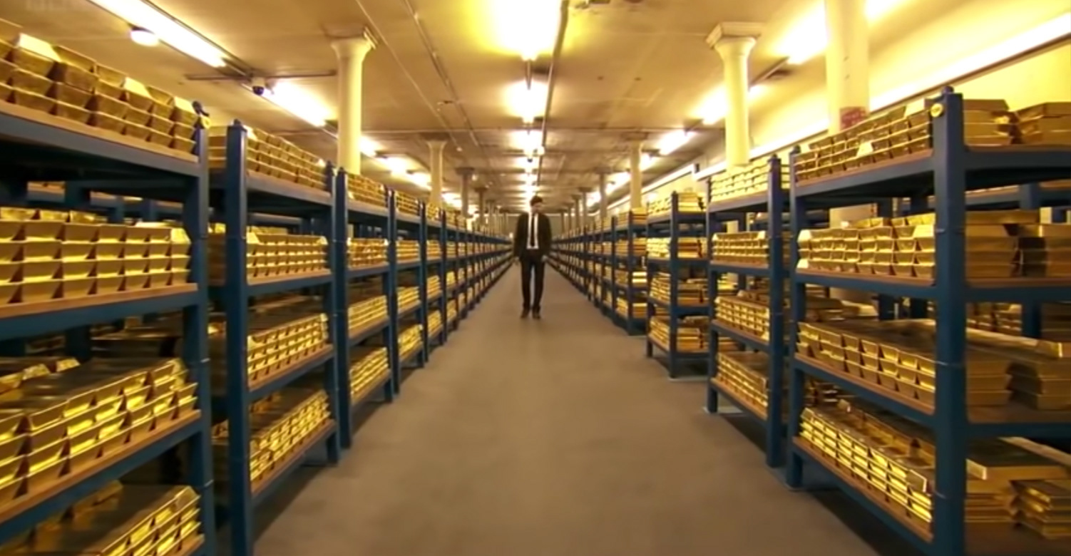 There are 400,000 bars of gold, worth over £200 billion. A typical gold bar weighs around 400 troy ounces (12.4kg), so that equates to a total weight of 4880 tones. The Bank of England is the second largest keeper of gold in the world. As of 2019, the vault housed approximately 497,000 gold bars, with a combined weight of about 6,190 tons.