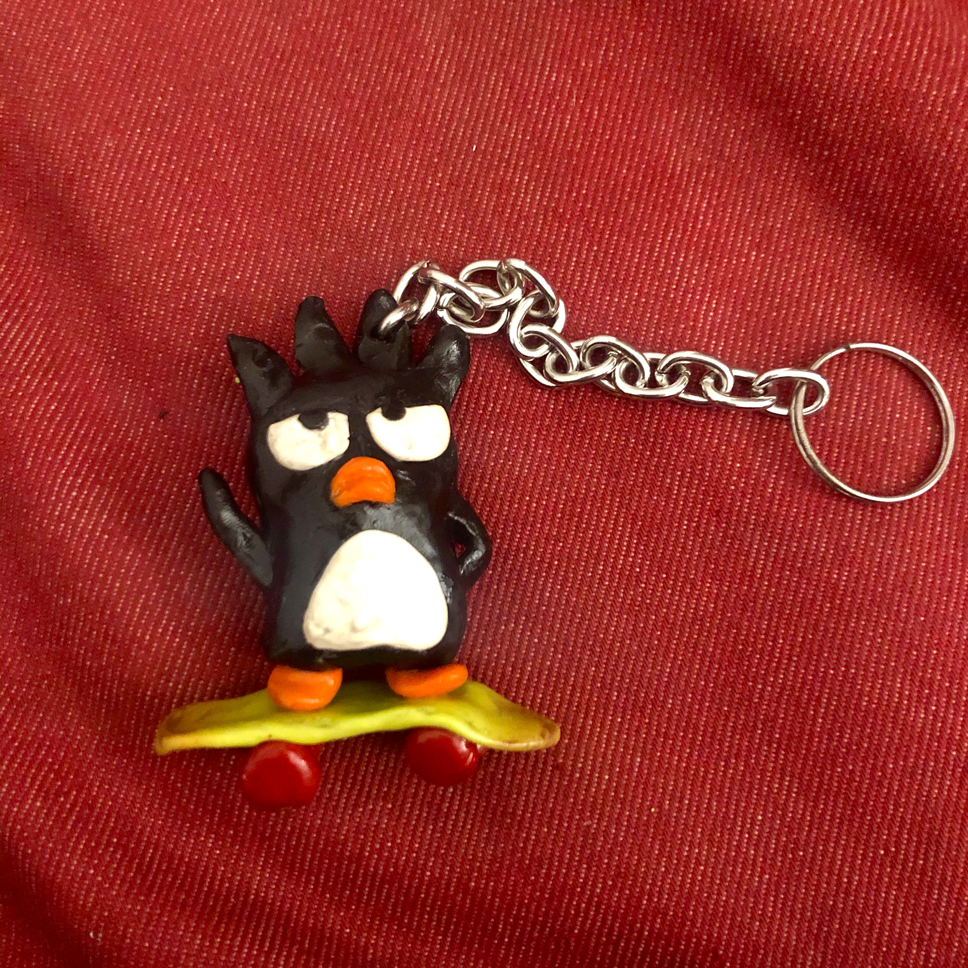 "Badtz-Maru on a Skateboard", 2020, polymer clay on keychain