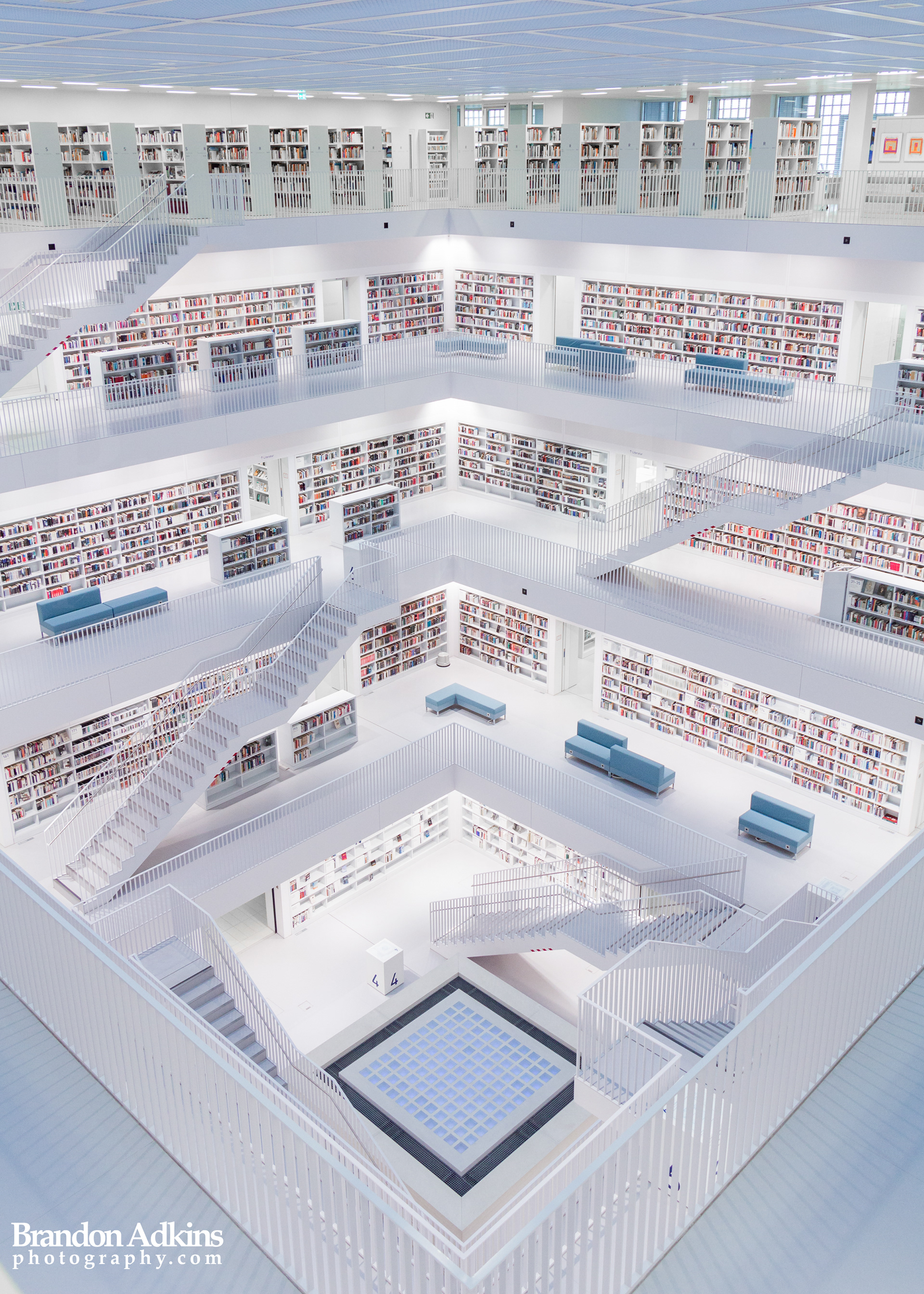 Fine art photograph of Stuttgart Public Library in Germany with white floors and stairs
