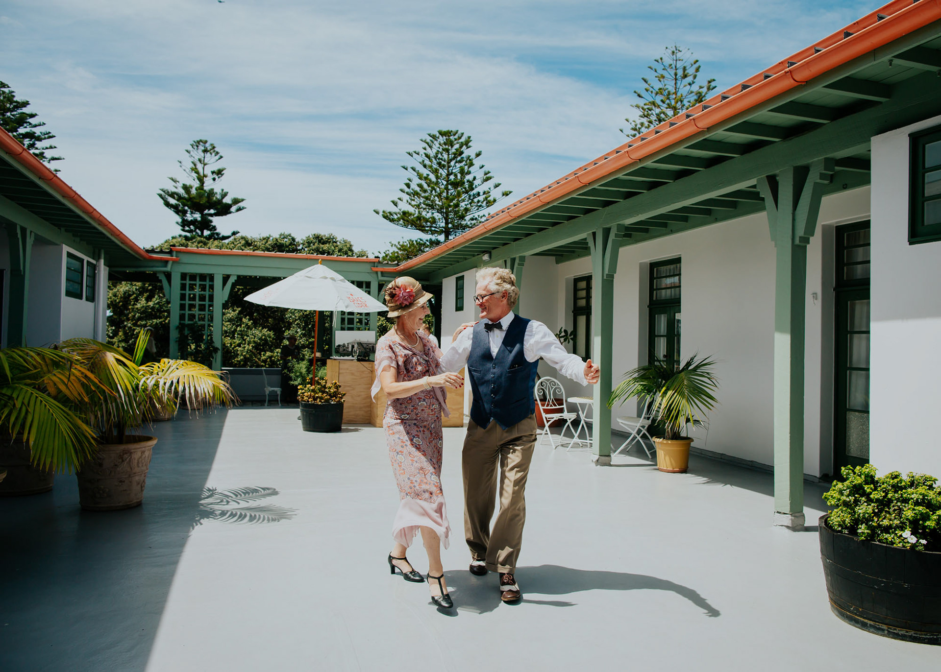 A couple dancing together in the Hawke's Bay sunshine