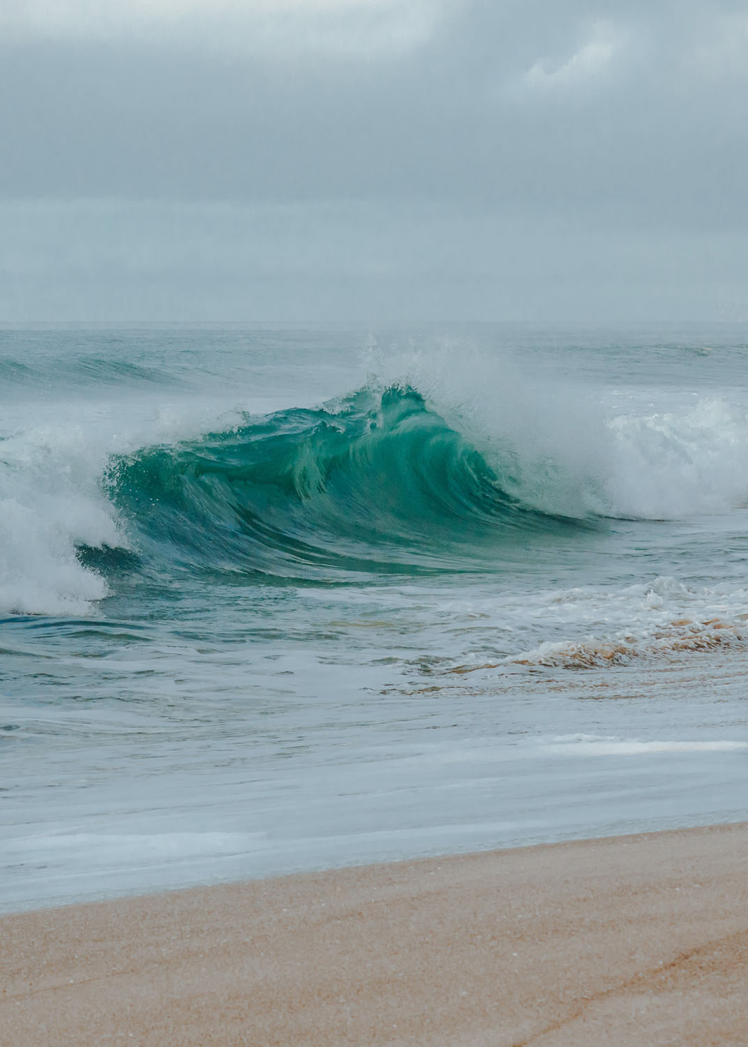 Waves breaking on the beach