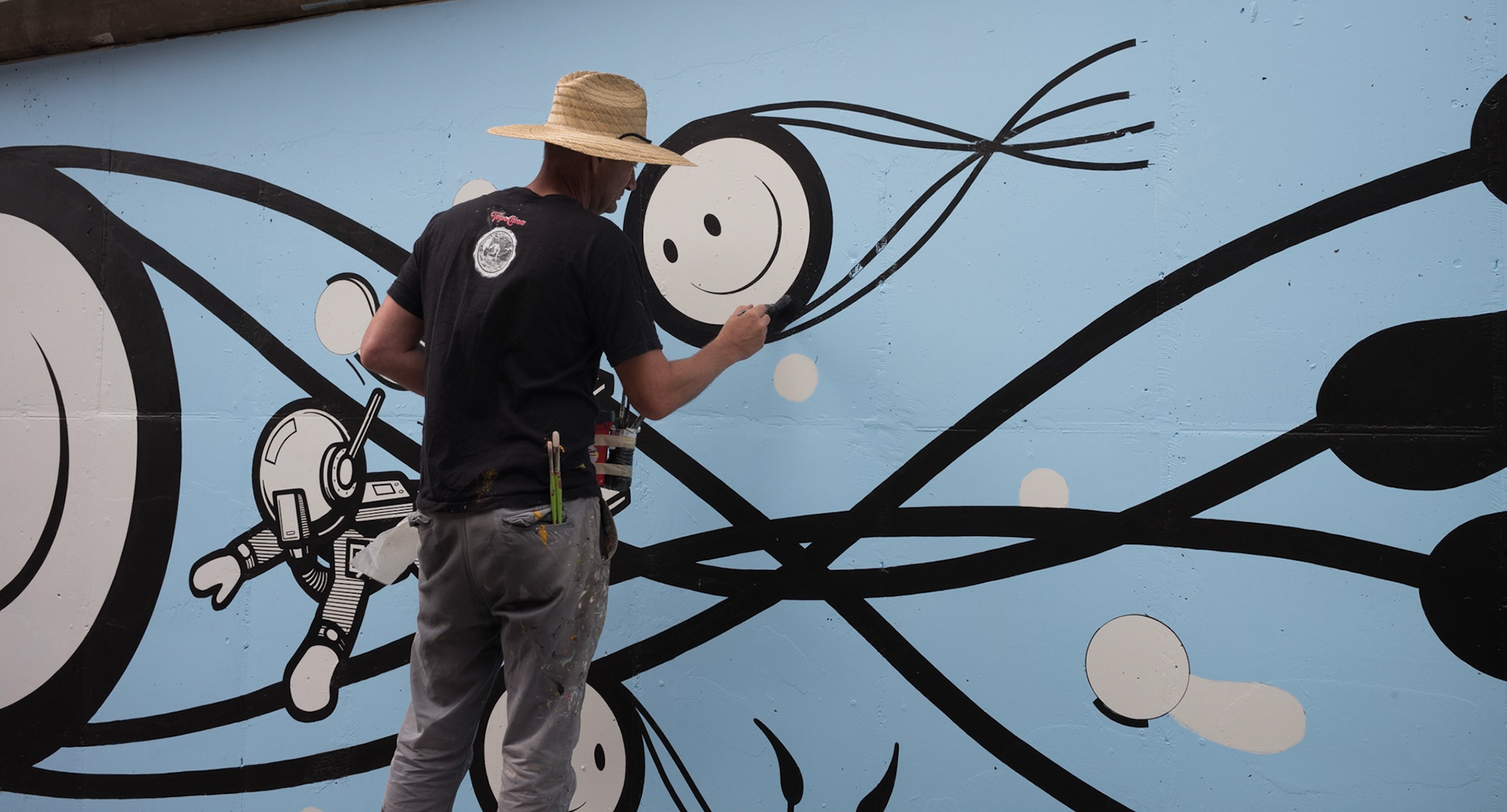 Rhino Man Painting Walls