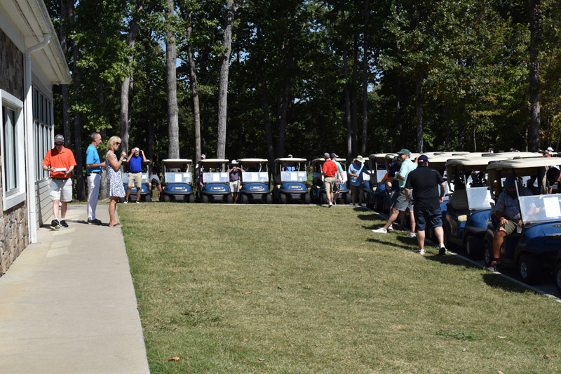 Golf carts lining up for shotgun start