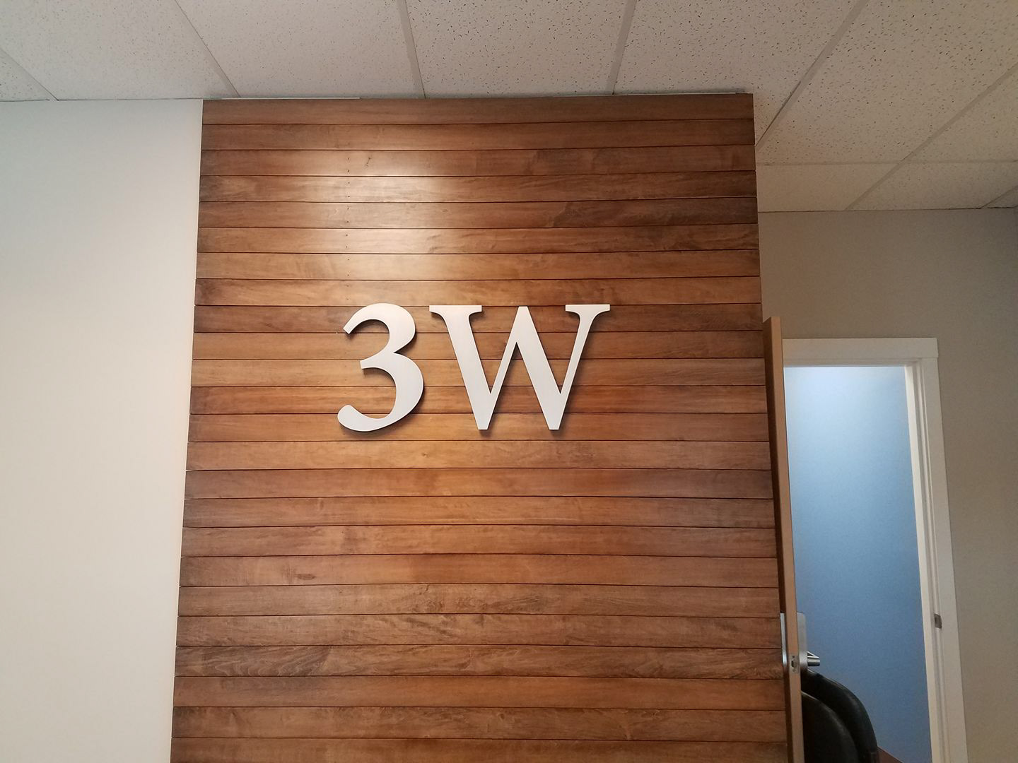metal wall logo decor