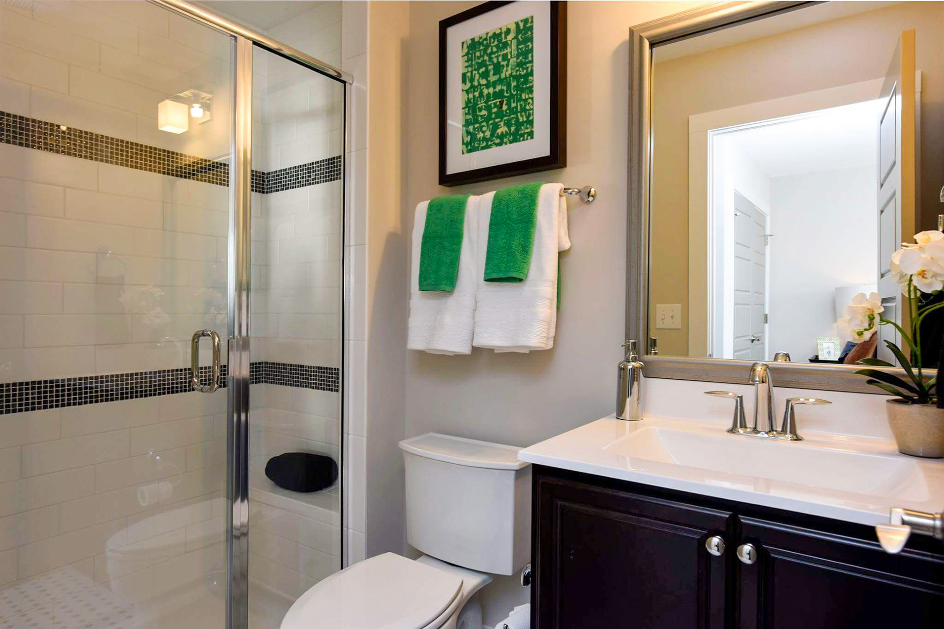 Personal Selections: Tile & lighting. Other selections made by Model Home Interiors. Photo Credit: Stanley Martin Homes.