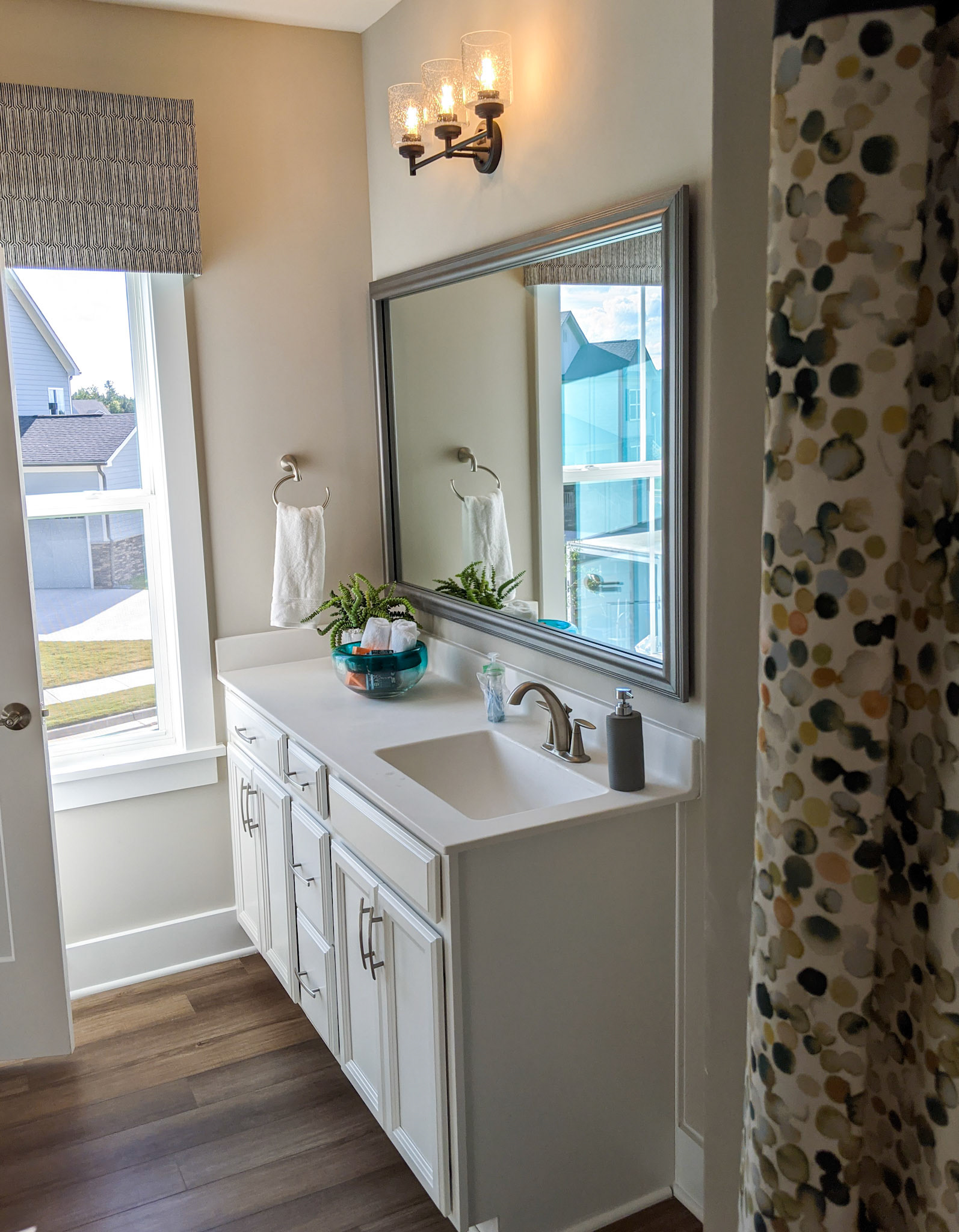 Personal Selections: Cabinets, counter top, hardware, plumbing, tile, and lighting. Other selections made by Model Home Interiors.