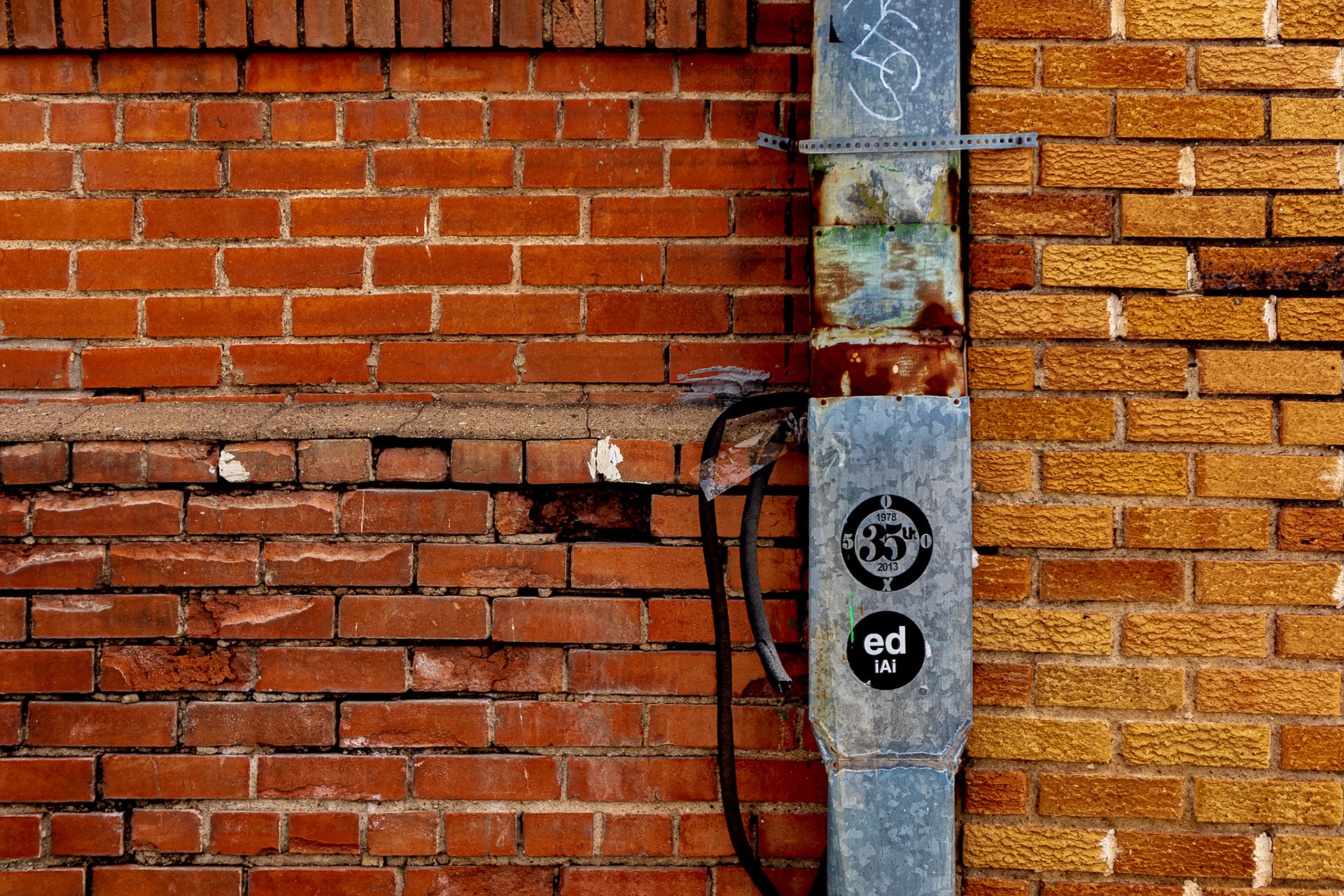 Two different brick textures offset by a pipeline.