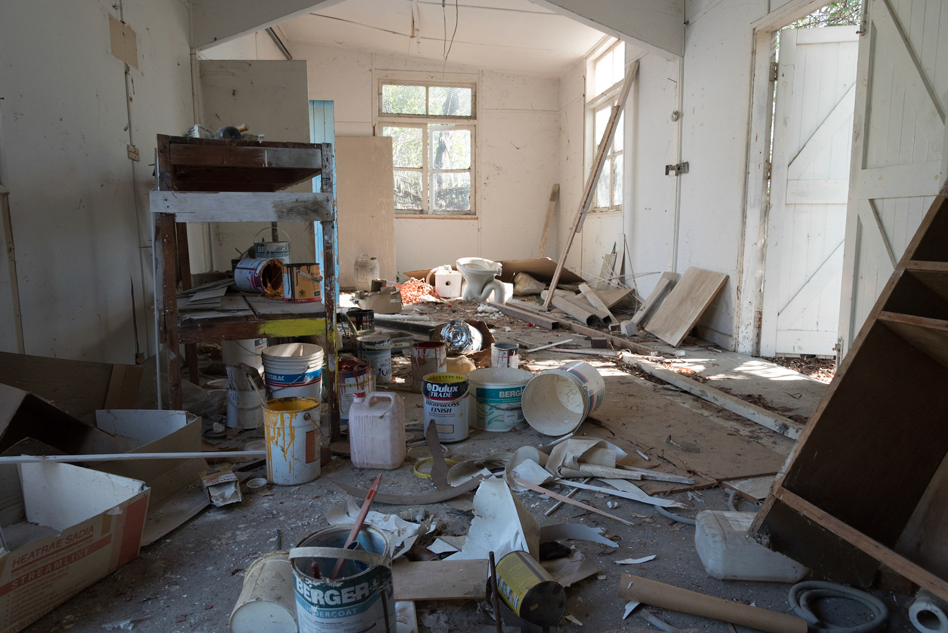Paint buckets at the abandoned Berengaria Village in Limassol, Cyprus