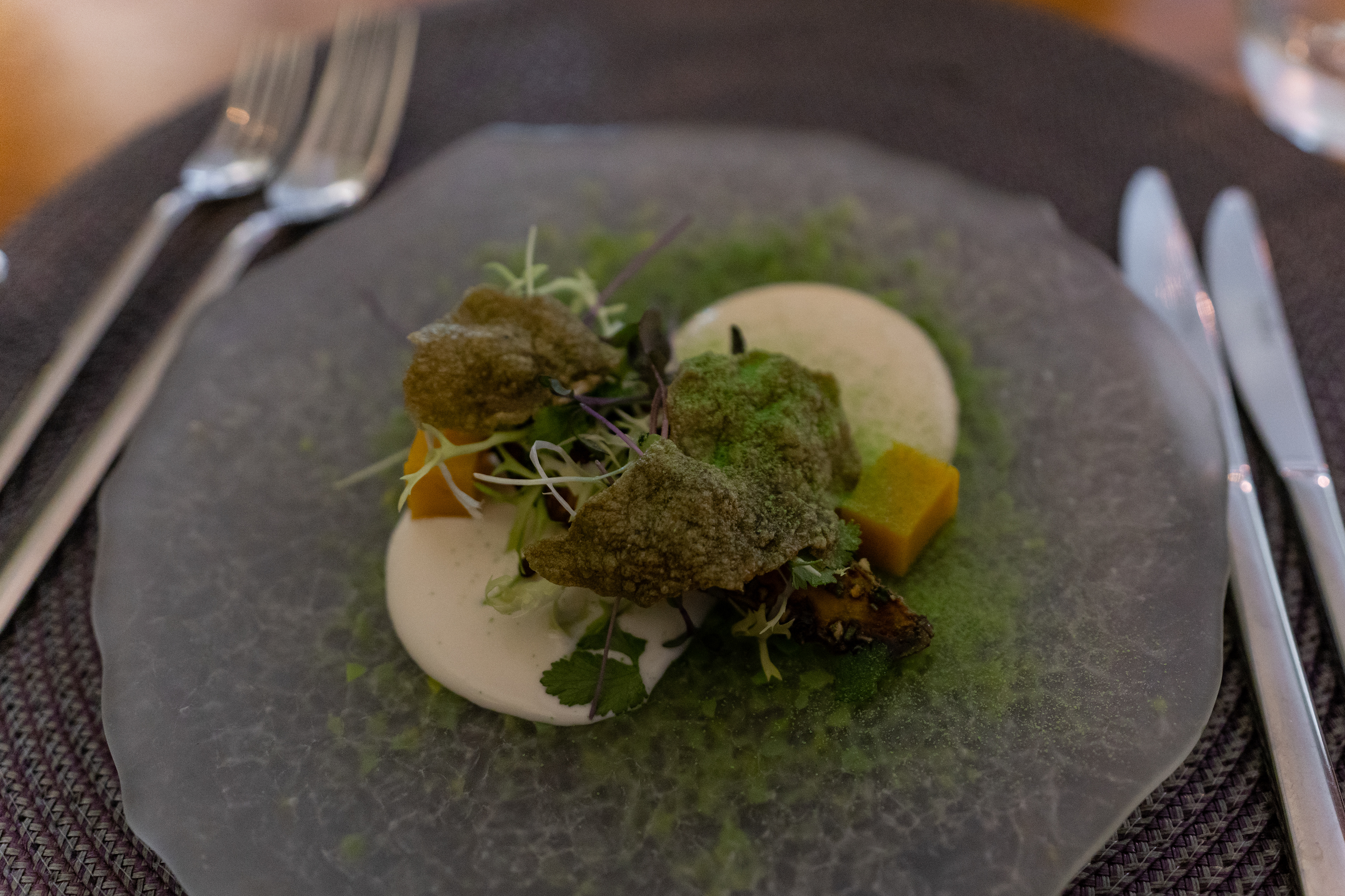 Cured and smoked avocado, shrimp mousse, spicy coconut