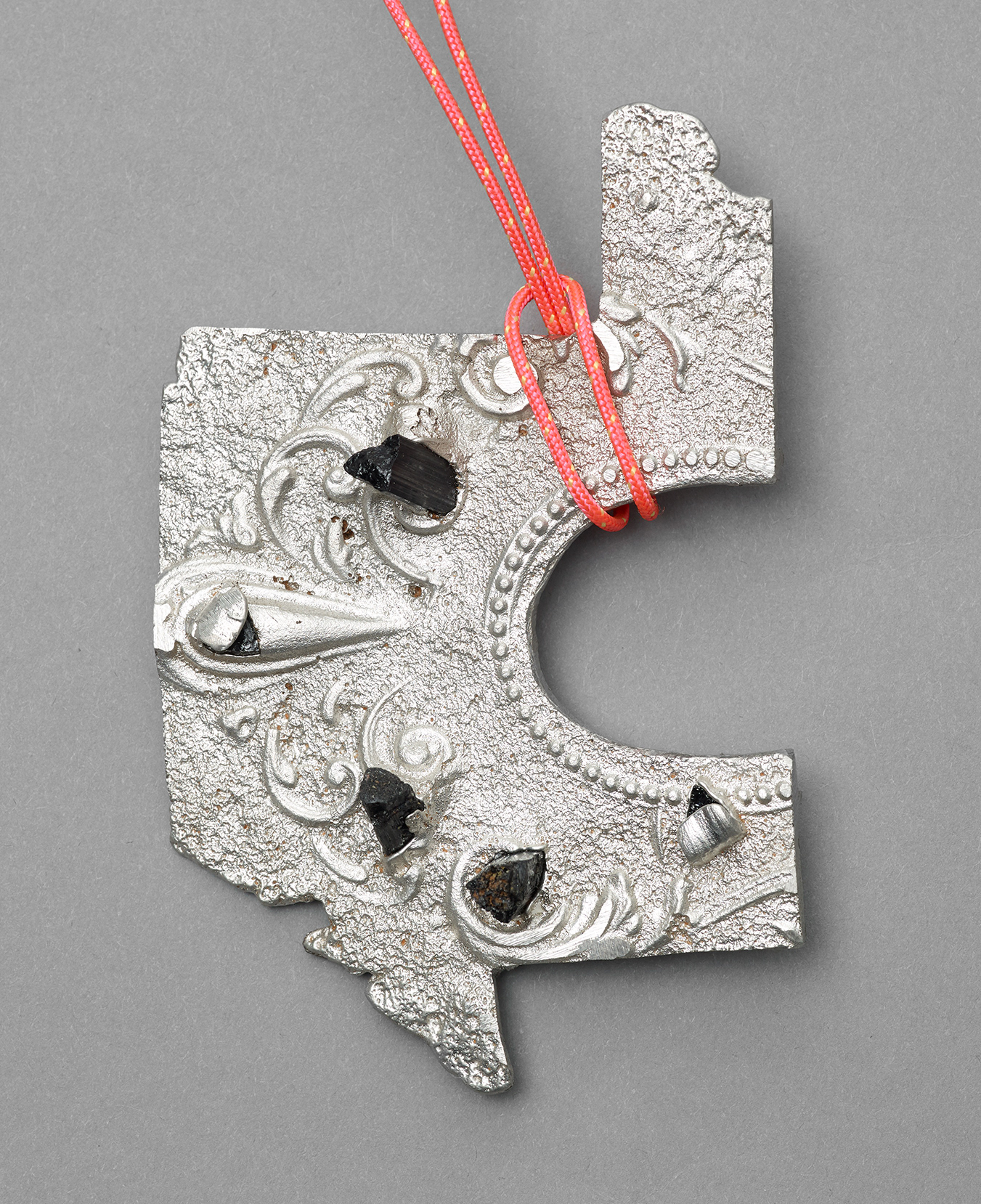 No.10 Item: Pendent H 11cm W 6.5cm D 1.5cm Materials: Pewter, Tourmaline, nylon Photo credit: Michael Pollard