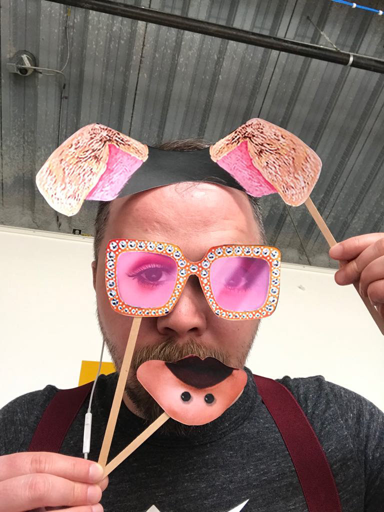 Adam wearing paper prototype costumes