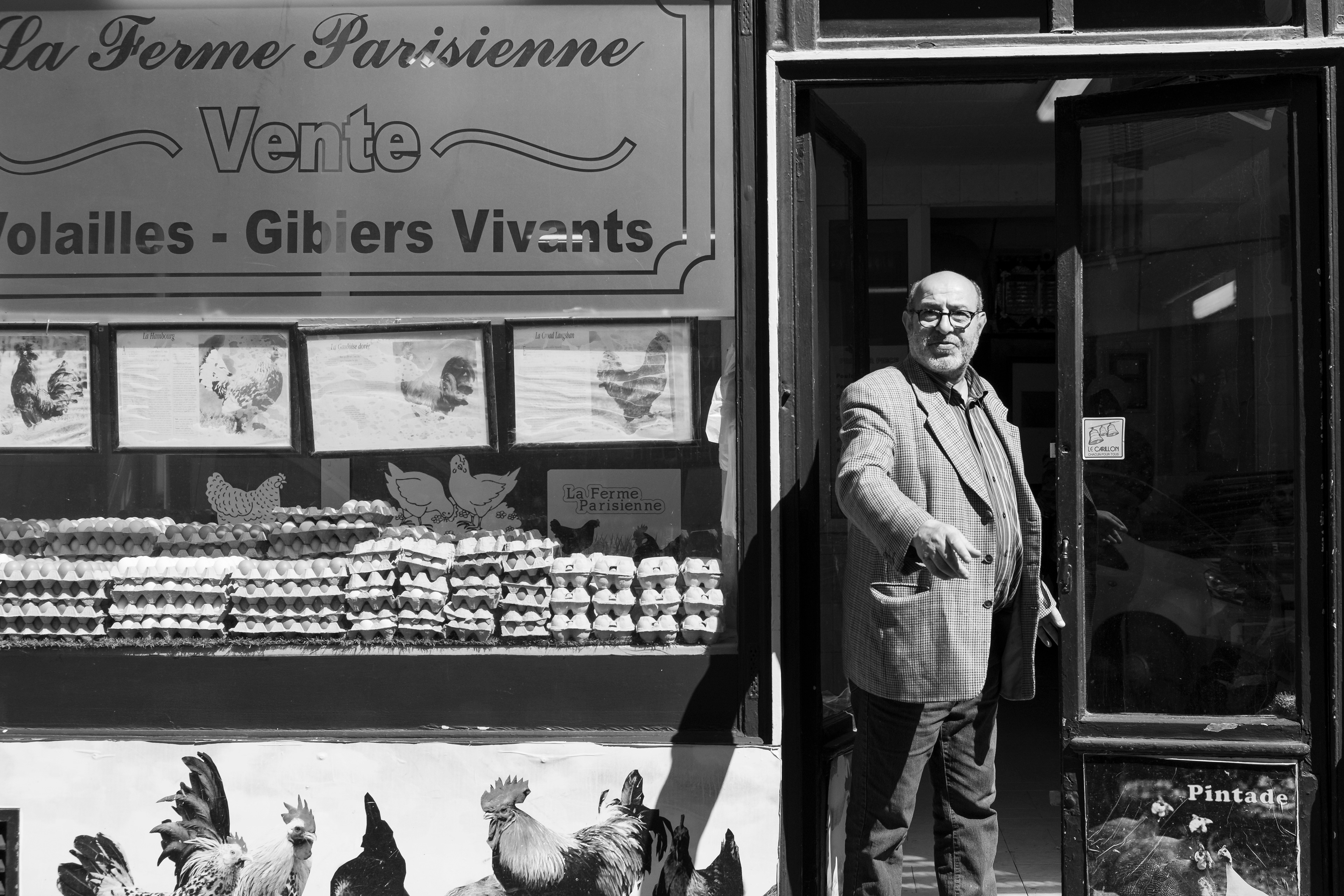 Zakari Megharbi in front of La Ferme Parisienne, 22 Rue Myrha, La Goutte d'Or, Paris