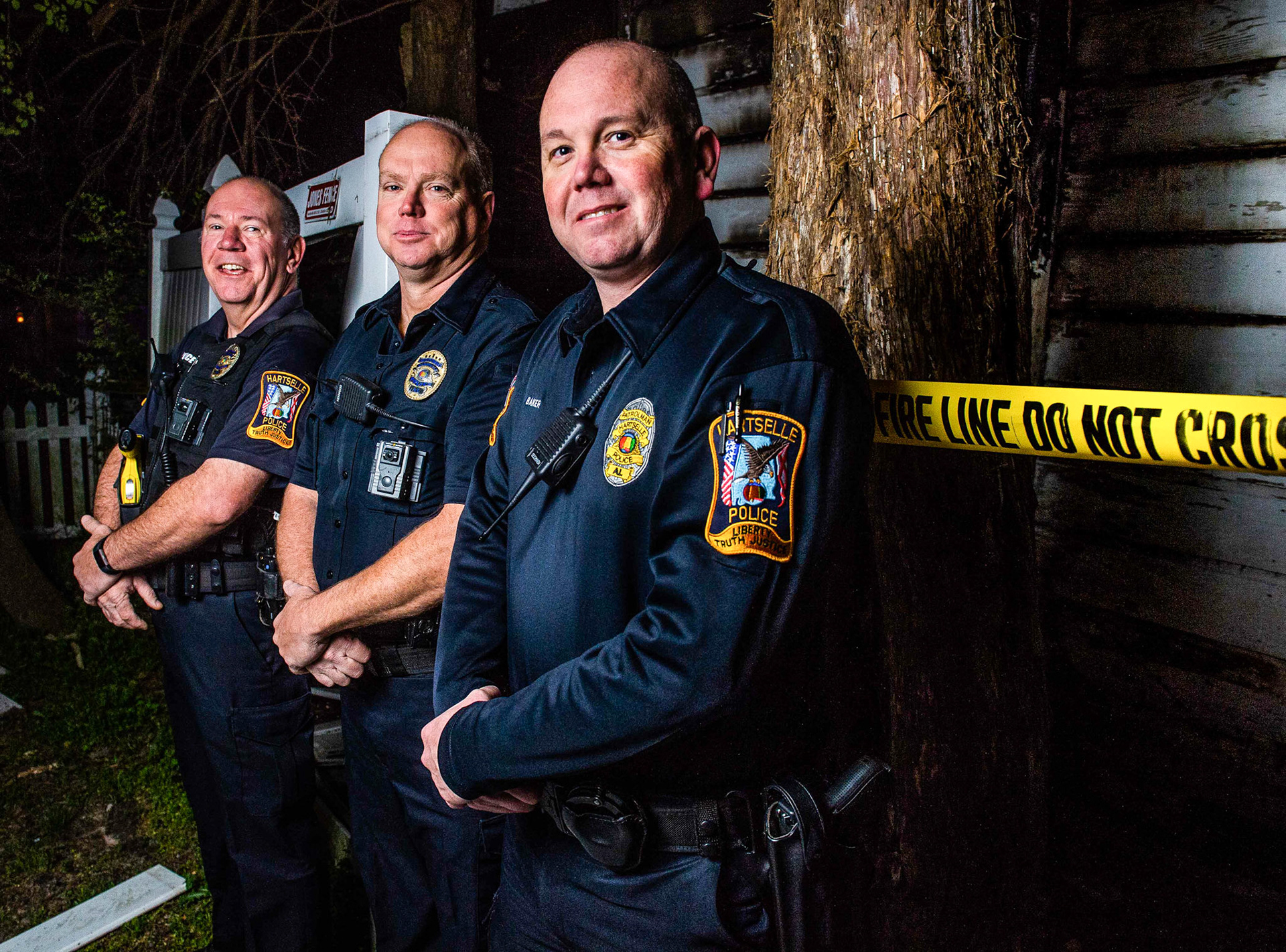 Hartselle Policemen Robert Baker, from left, Robert Finn, and Roger Speake stand for a portrait on Friday, March 22, 2019, in Hartselle, Ala. The group rescued a woman from a house fire on February 22 in Hartselle.