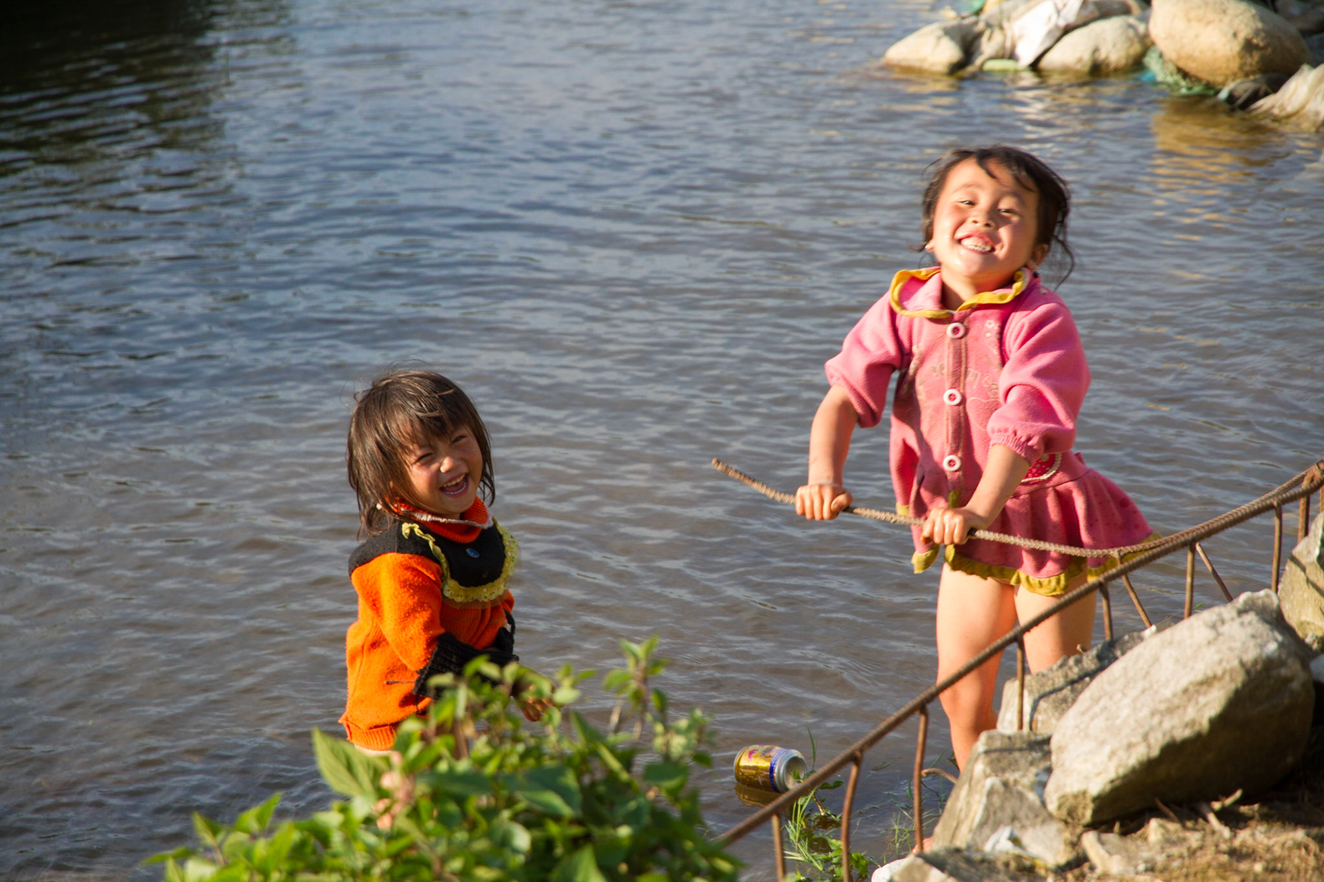 Children playing in the river