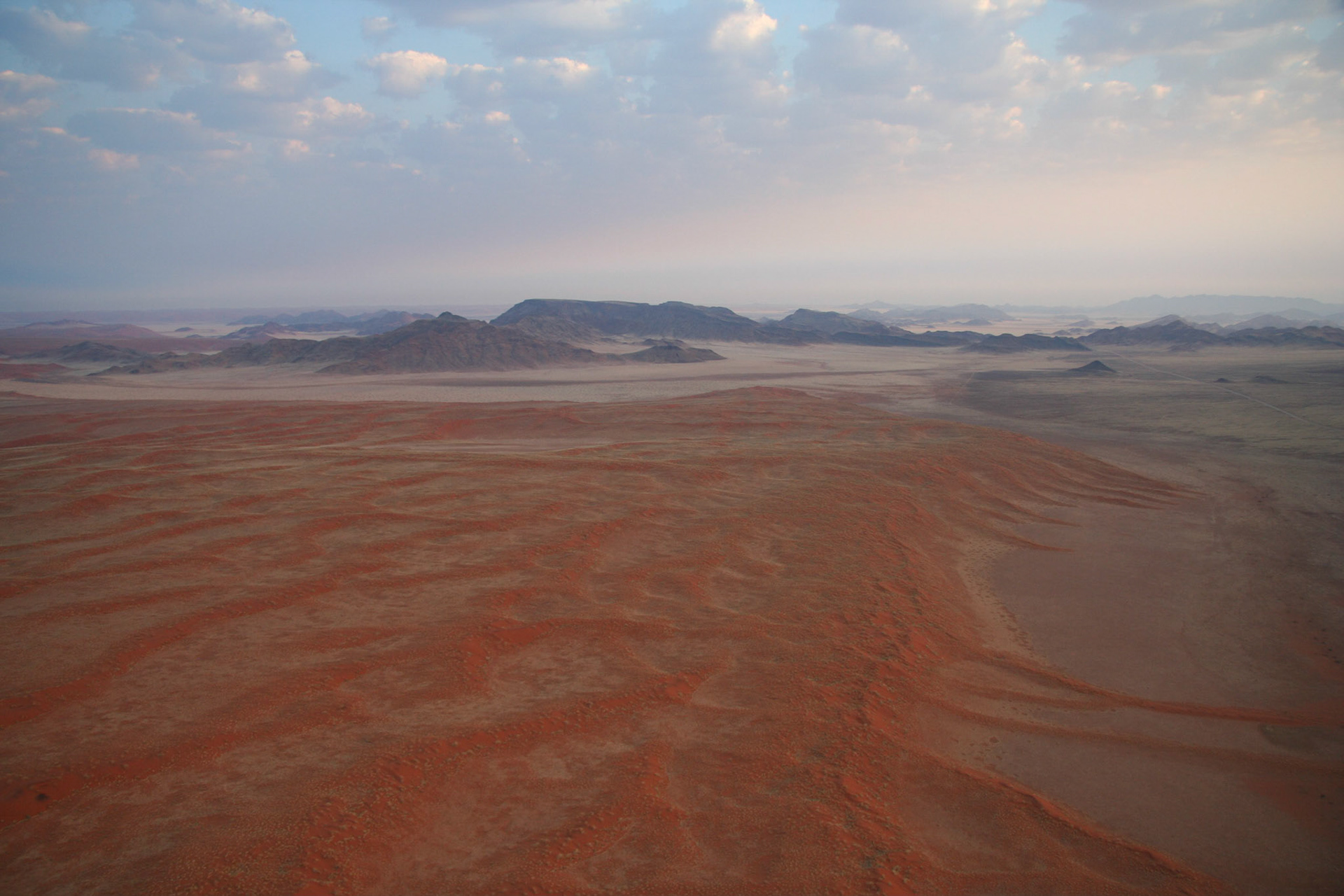 Over the edge of the dunes, looking towards Sossusvlei Mtn Lodge