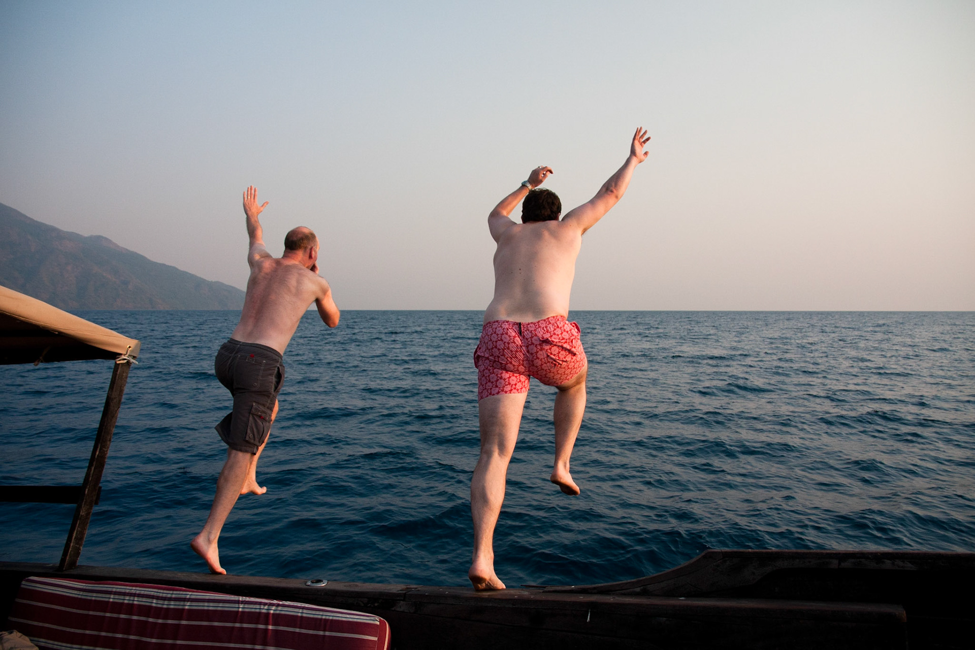 Alex and Tim jumping in to Lake Tanganyika