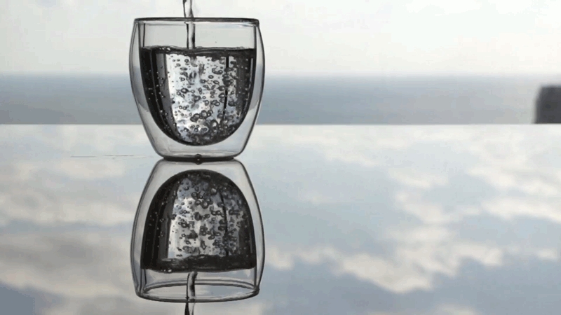 Cinemegraph of water filling a glass