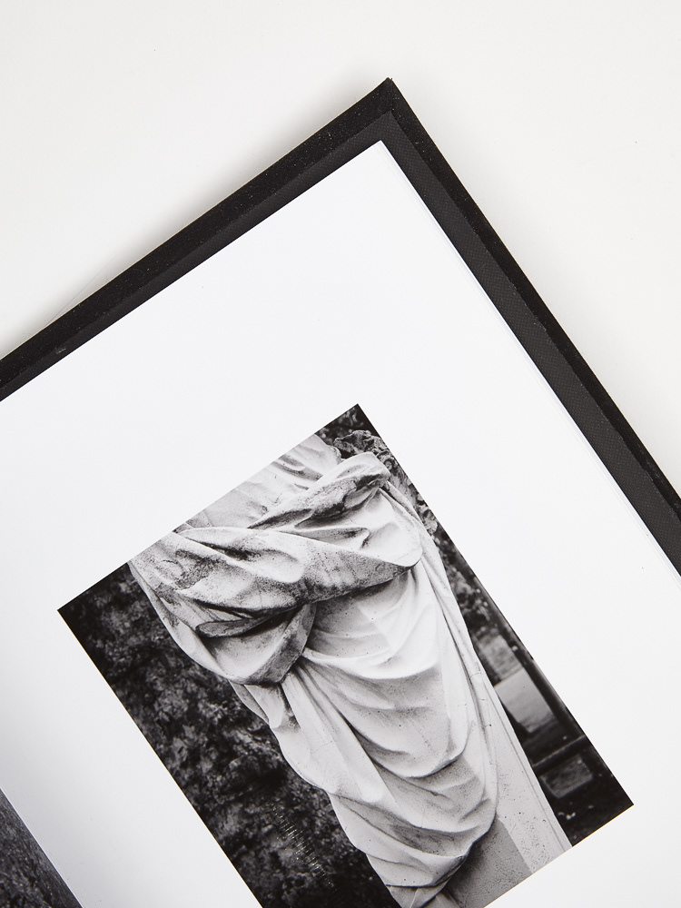 The inside covers of the portfolio are lined with book lining paper with a small border to set off the outer book cloth covering