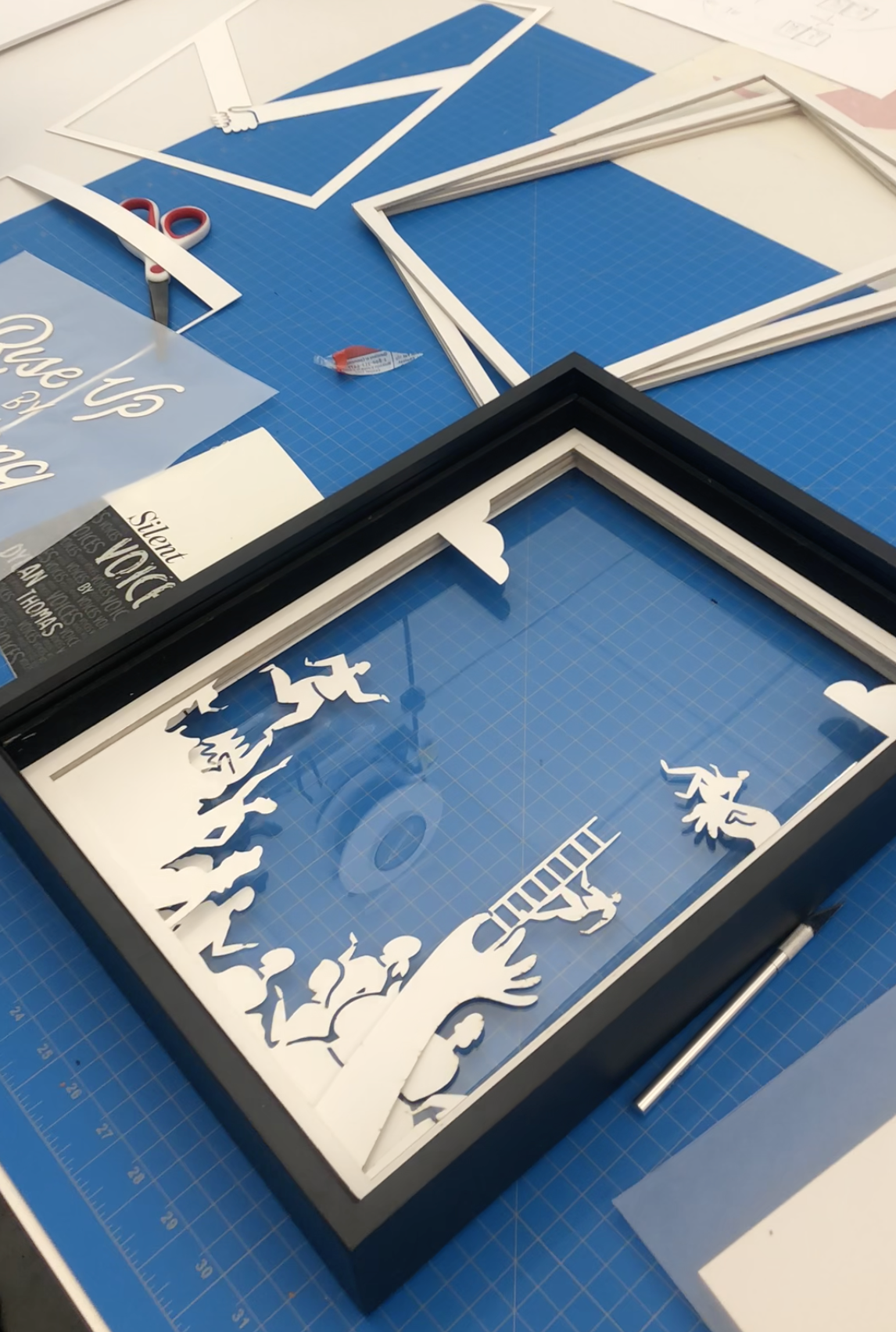 Layering paper in-between foam frames