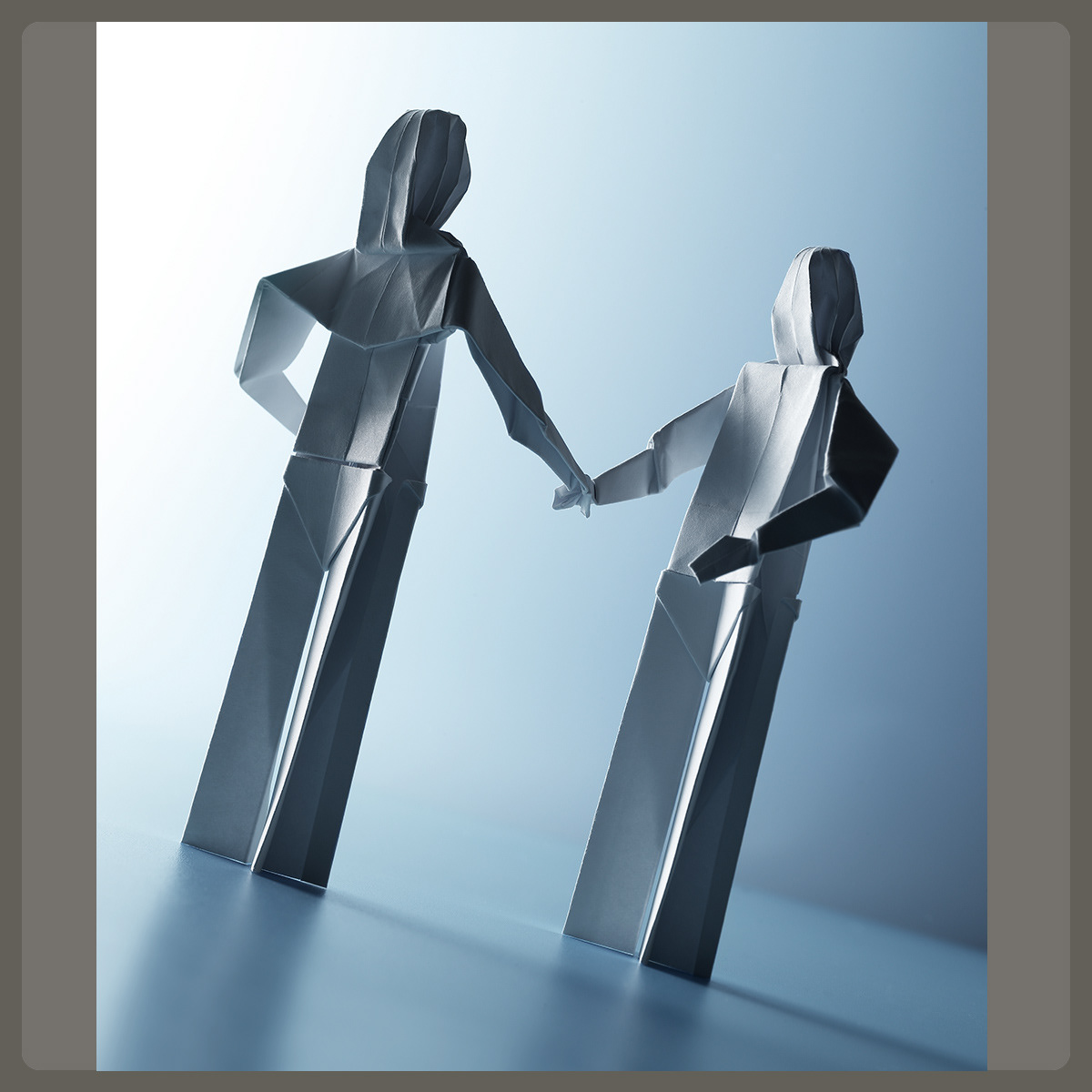 Origami figures, conceptual image, Pete Gardner, Photographer, Studio, Still Life, London, UK, © Copyright Pete Gardner