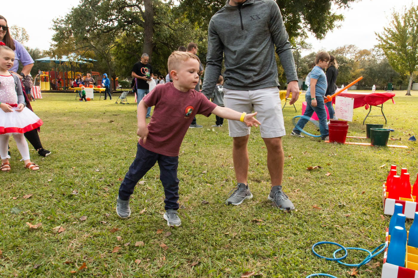 Owen Arthur, age 4, of Clute plays the ring toss at the Teddy Bear Carnival held at Clute Municipal Park on November 17, 2019.