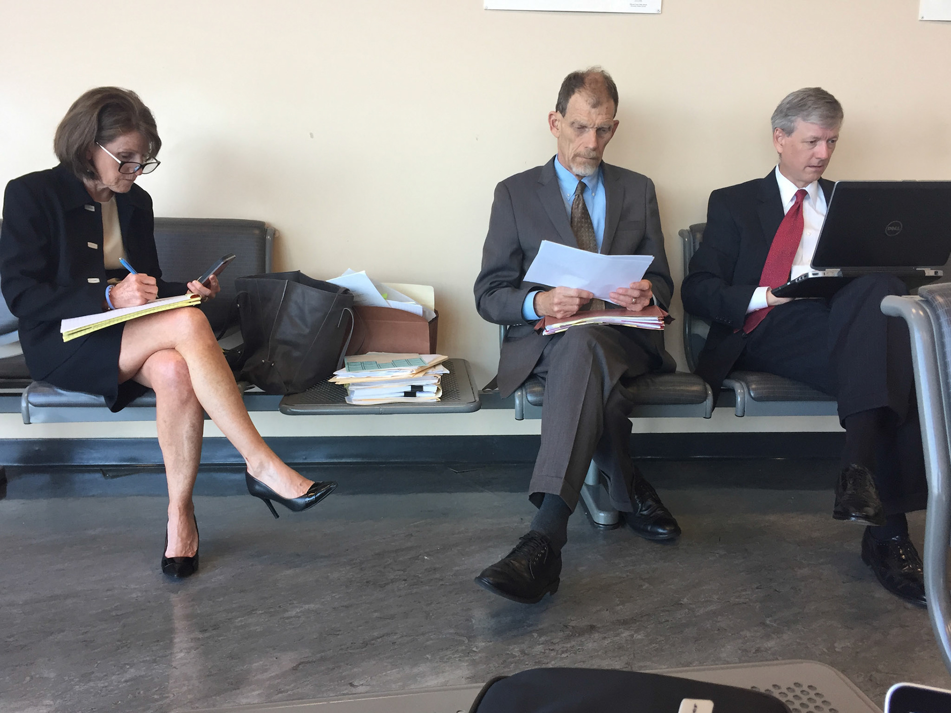 Amy Haffler, Allen Button and Thad Keal on a break during trial