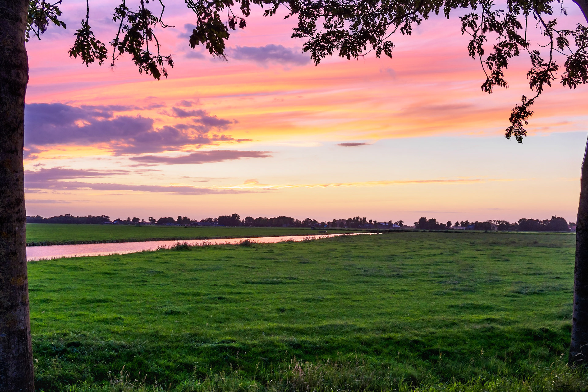 Vivid colored buccolic Sunset over dutch water IV