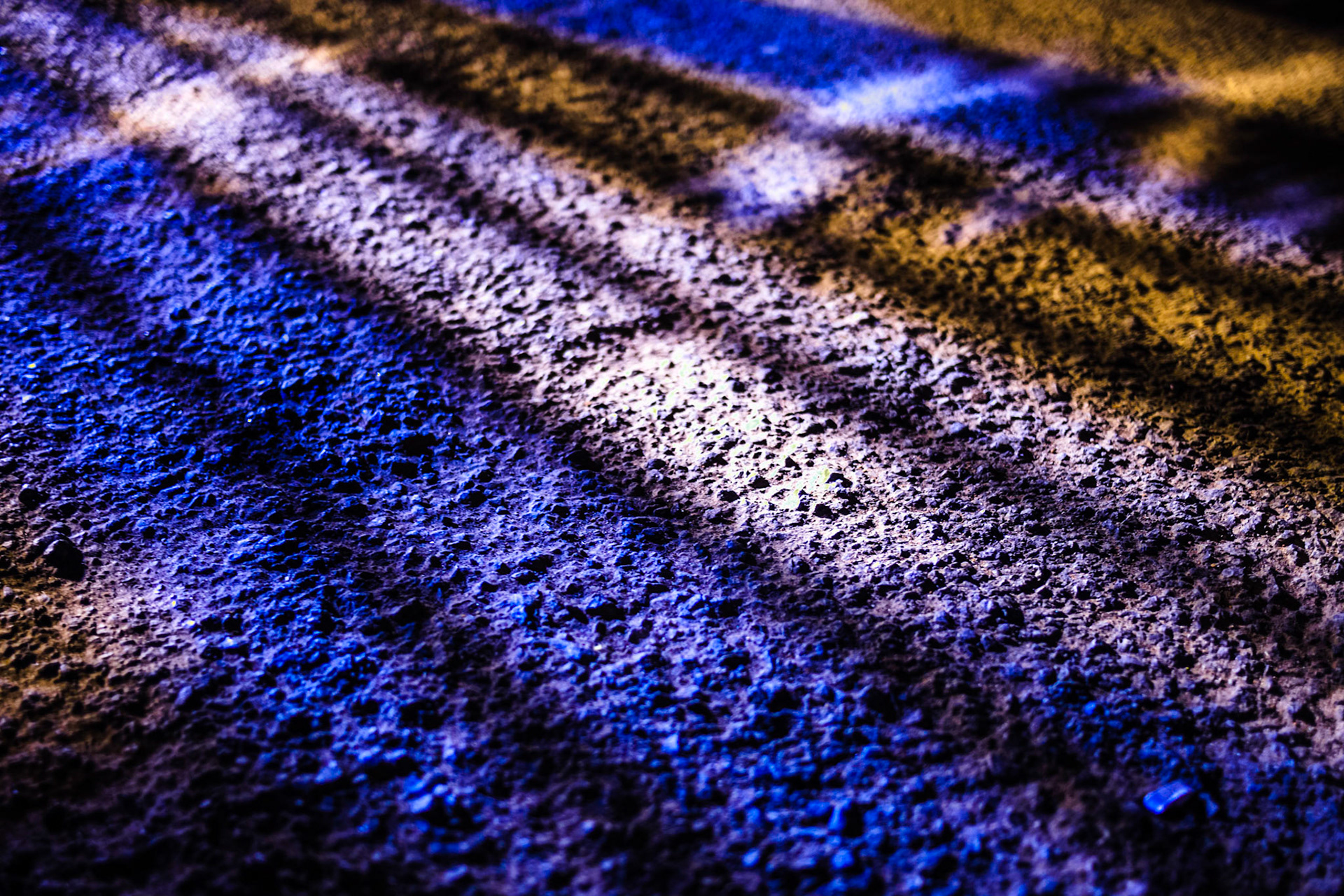 Rough blueish surface with black stripe pattern