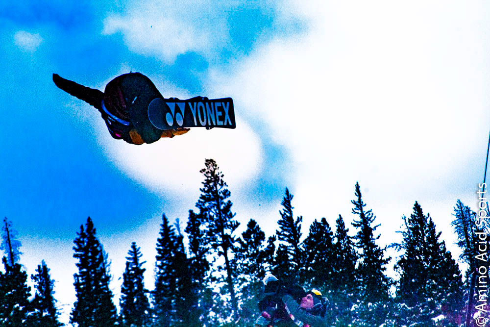 Nippon proud Yuto Totsuka flies outta the halfpipe right wall on his mute grab of his Yonex board