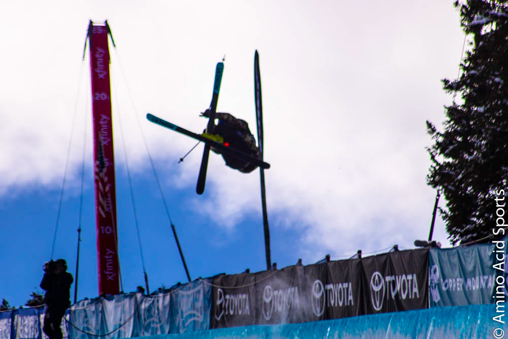 On his 1st Run, Lake Tahoe's David Wise corks his 900* heli mute grab.