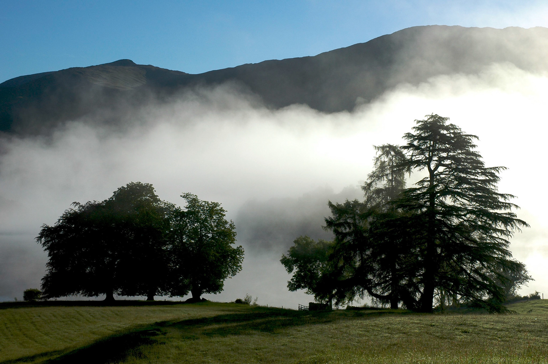 Early morning mist over Grasmere in the English Lake District