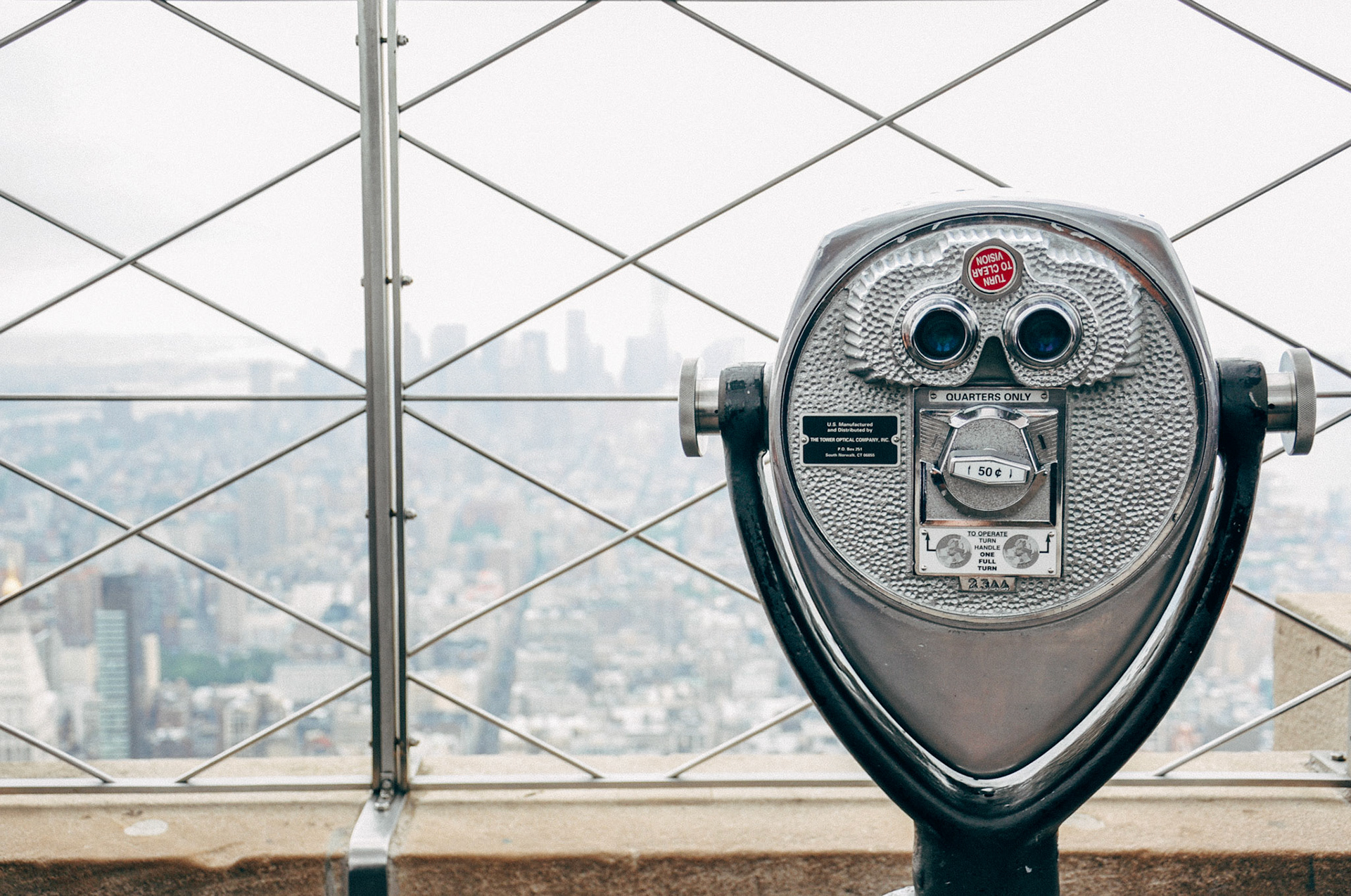 foggy day in New York City, viewed from the top of the Empire State Building.  Lower Manhattan is barely visable in the distance.
