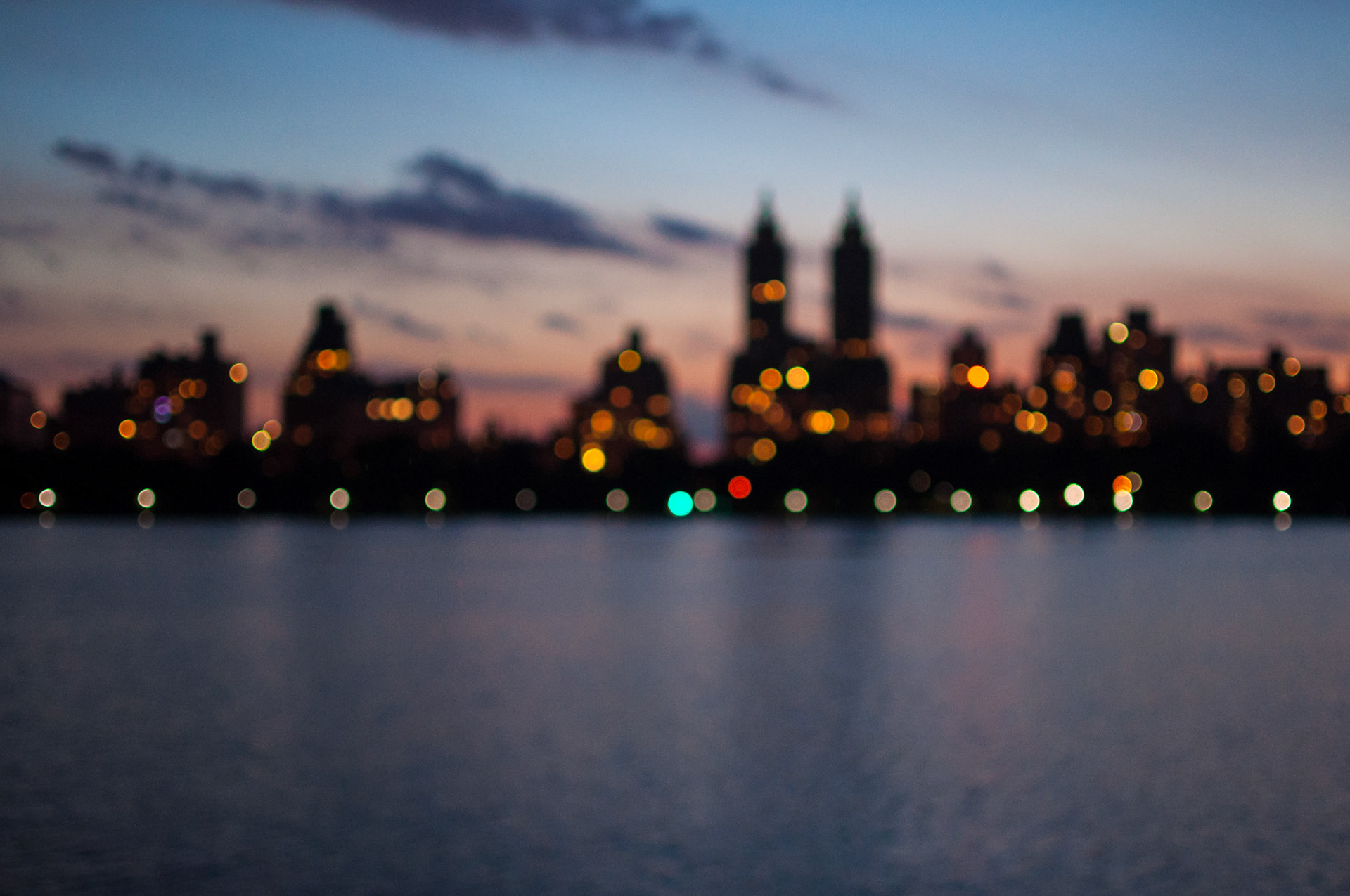 The sun sets over the Jacqueline Kennedy Onassis Reservoir in New York City.