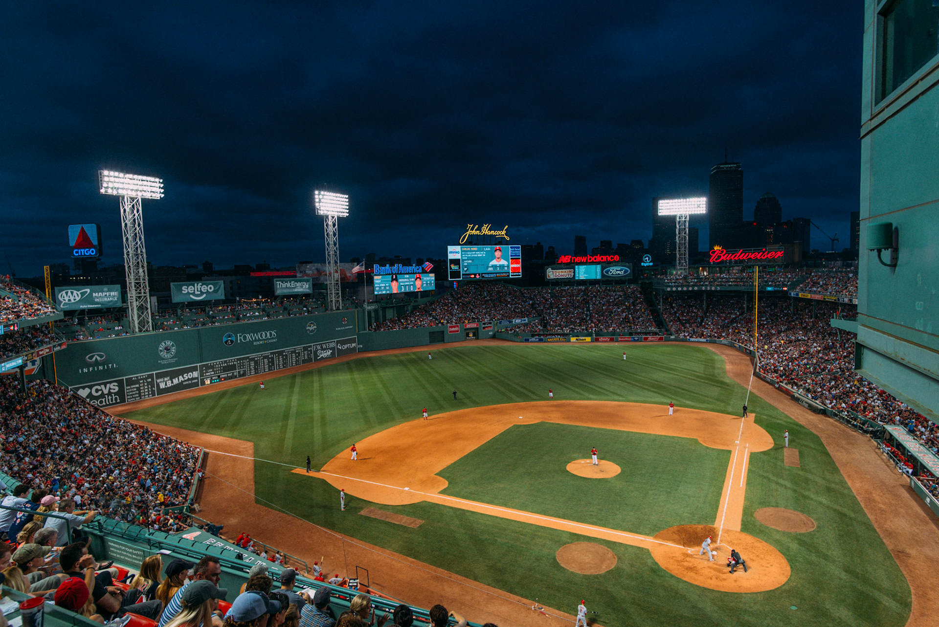 The Boston Red Sox play the Angels of Anaheim moments before a rain storm delayed the game.