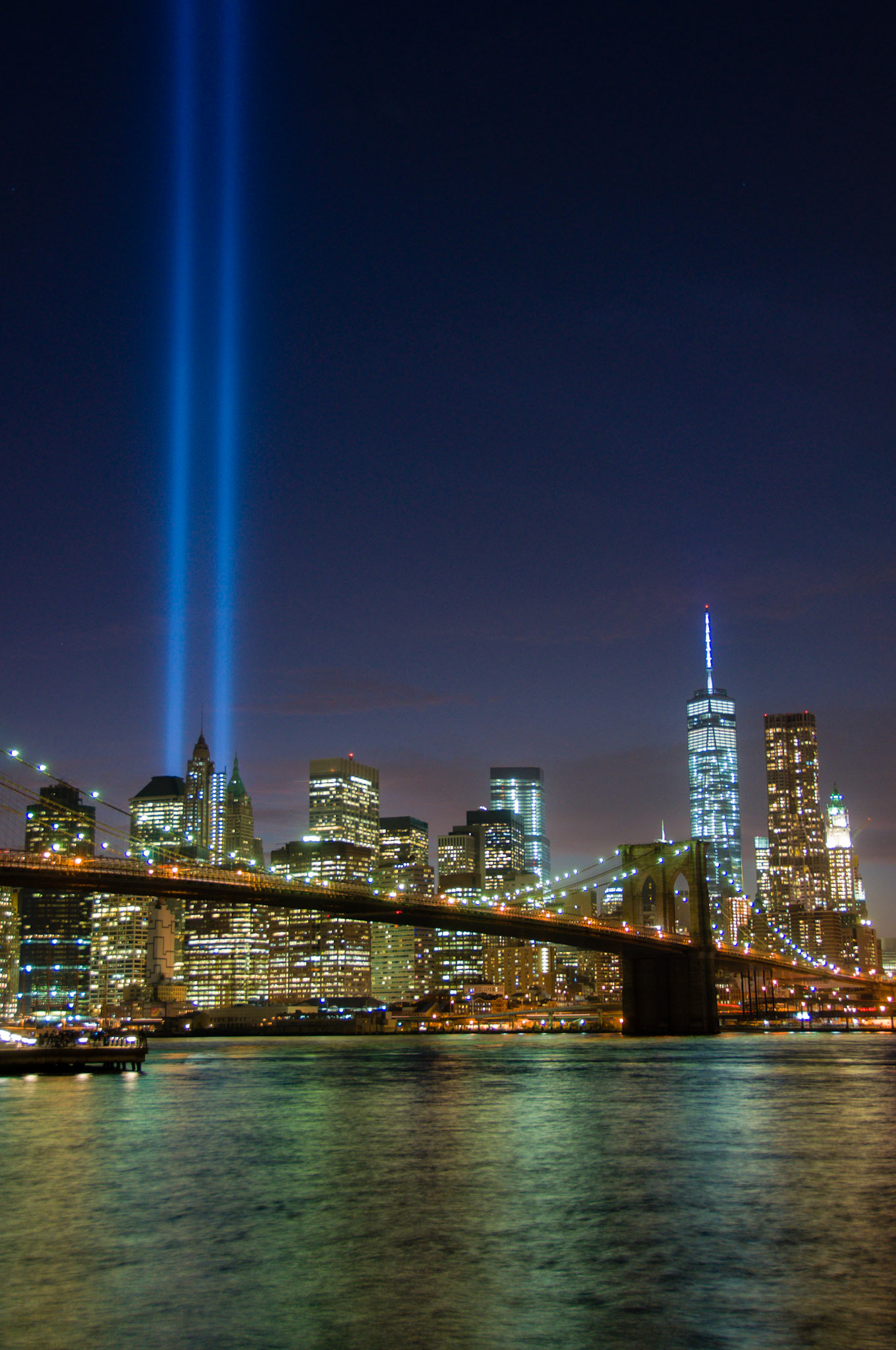 The September 11th Tribute in Lights, viewed from DUMBO, Brooklyn.  The lights represent the Towers 1 and 2 of the World Trade Center that were lost in the attacks on September 11th, 2001.