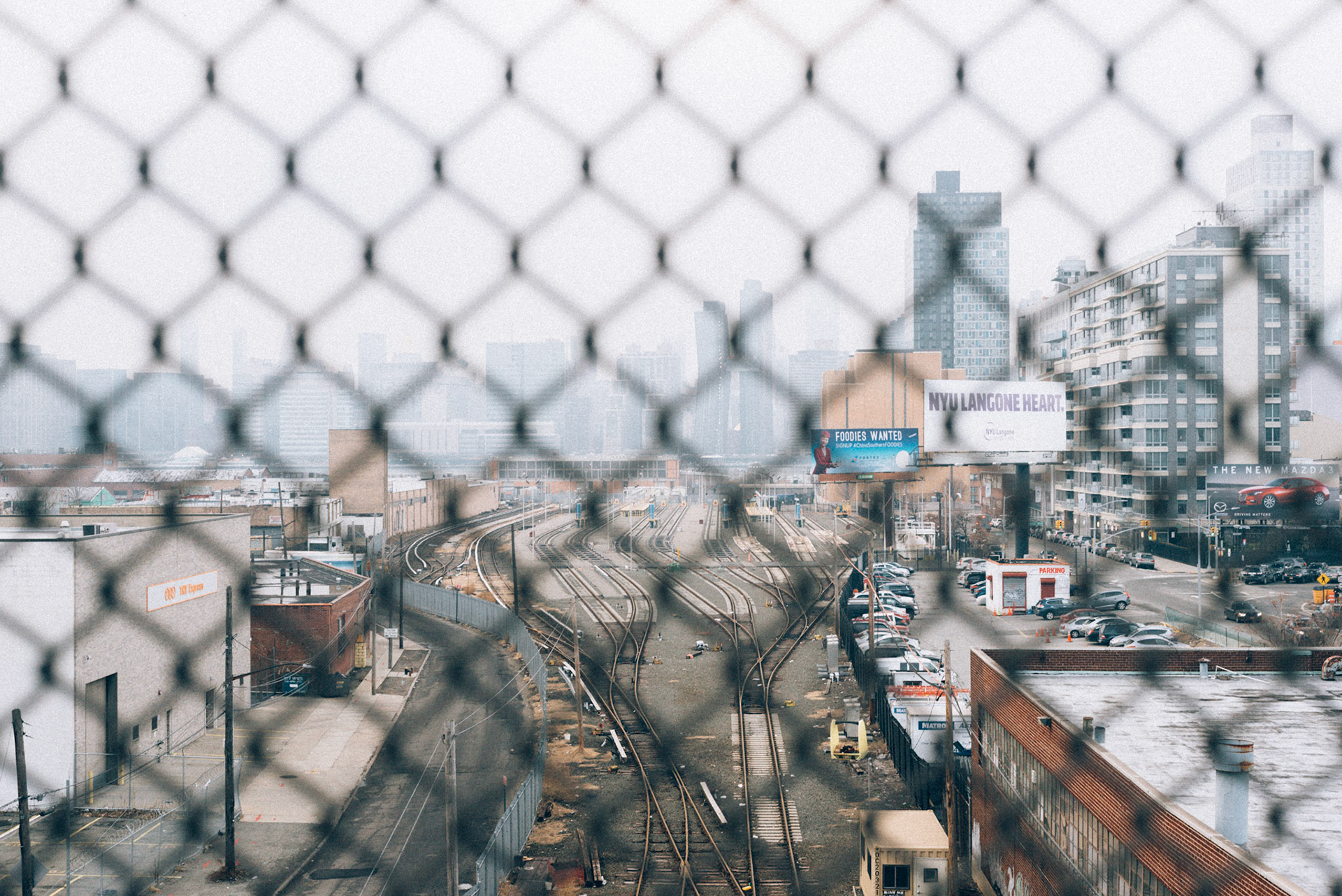 The midtown skyline is barely visible on a foggy day.
