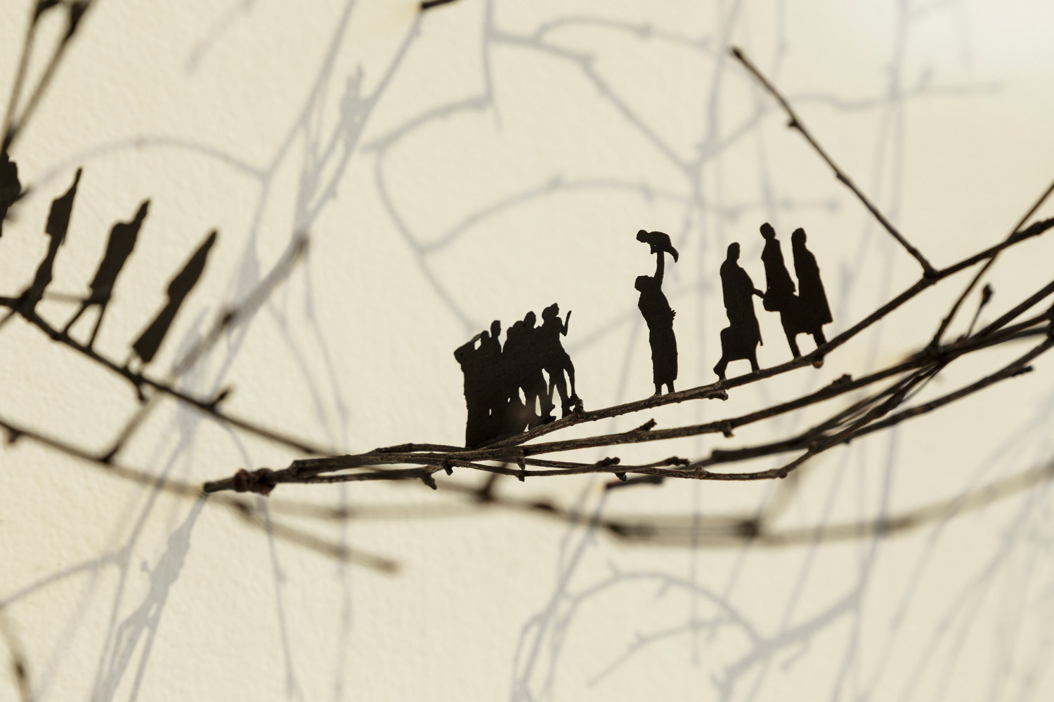 Prolonged by a Hundred Shadows (2019), twigs, paper, paint, twine, 240cm diameter