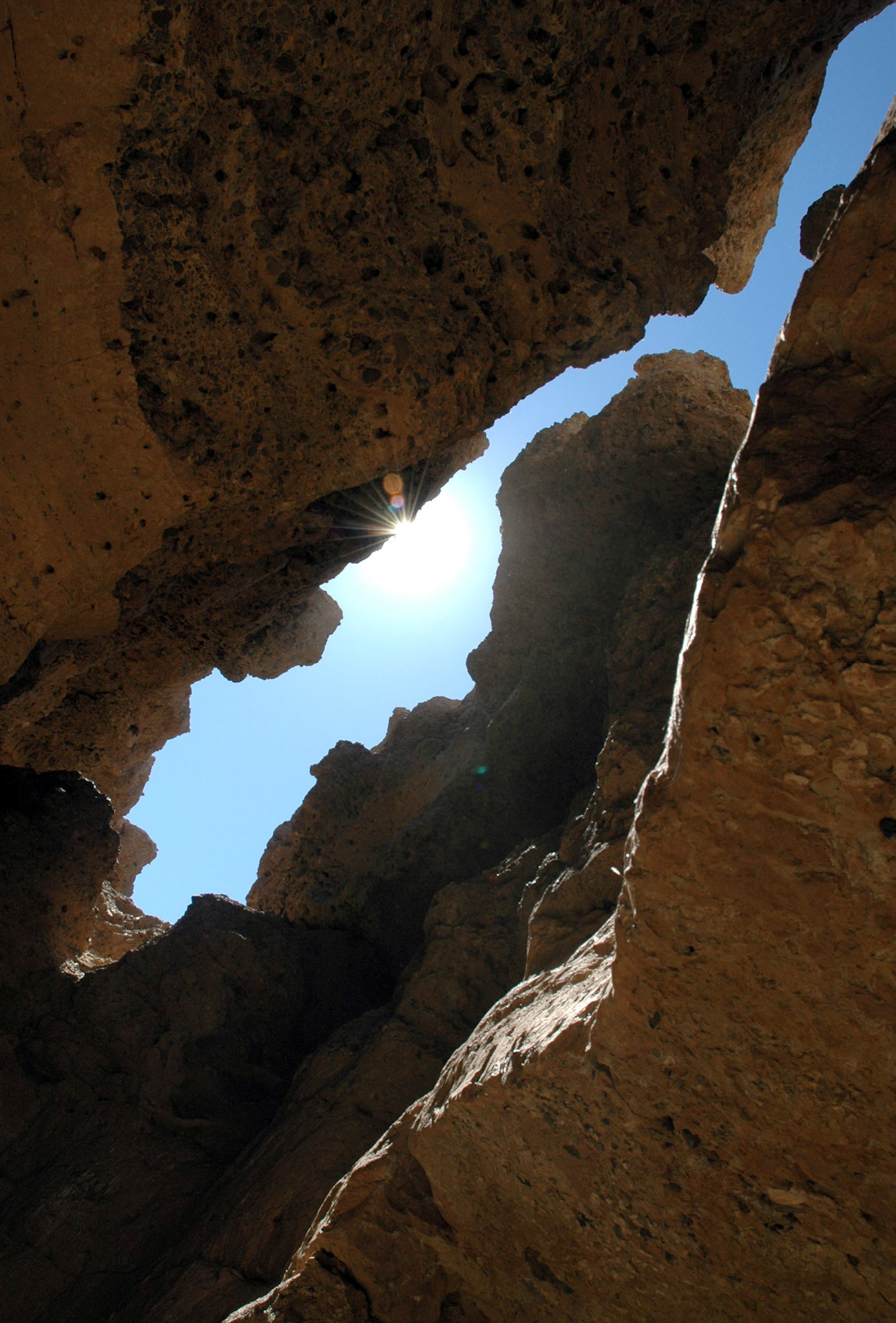 The sun produces extremely hot temperatures all year round. Occasional refreshment can be found only underground like here in Sesriem Canyon.