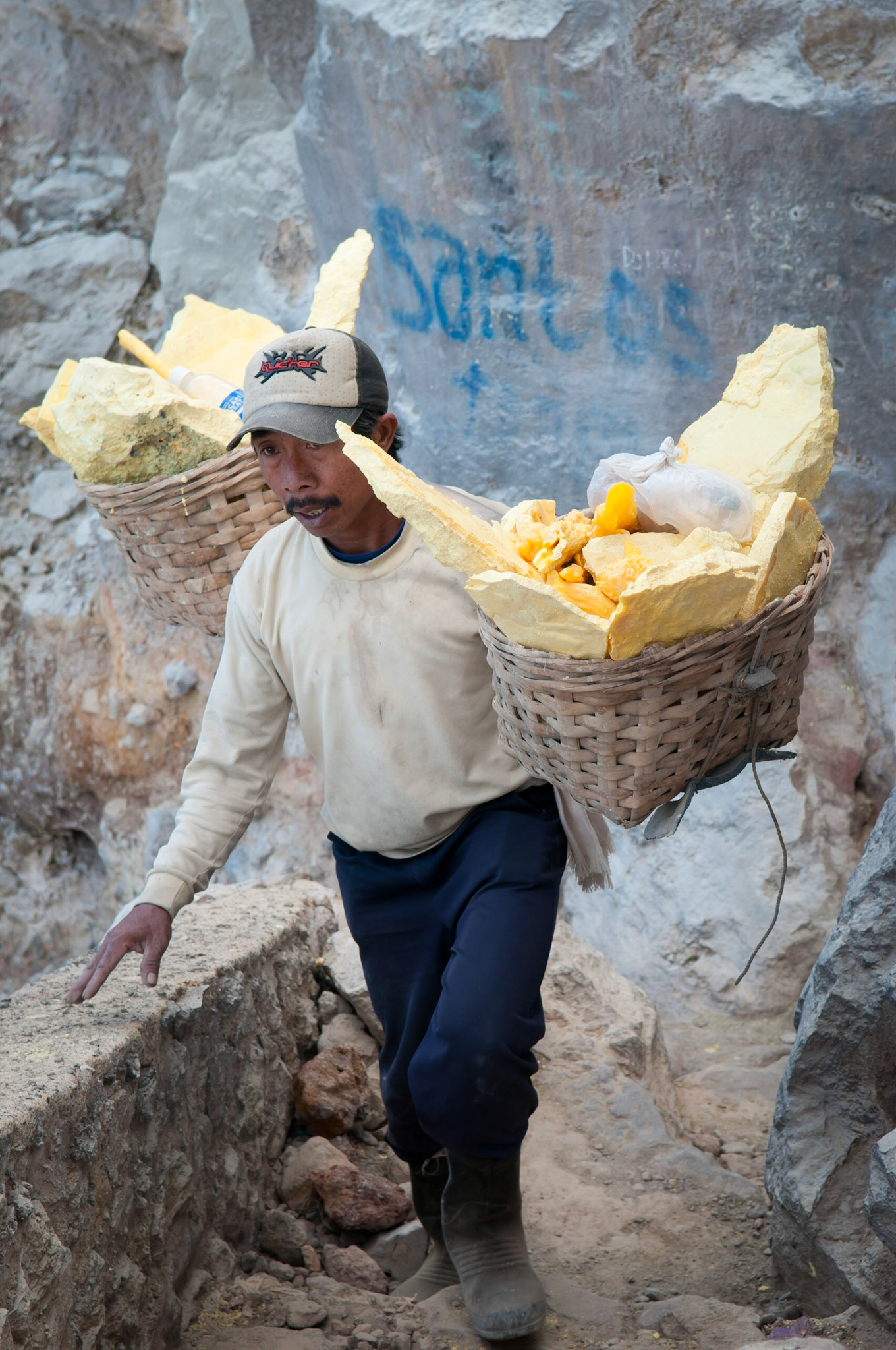 Porter climbing out of the crater (Kawah Ijen, Java, Indonesia)