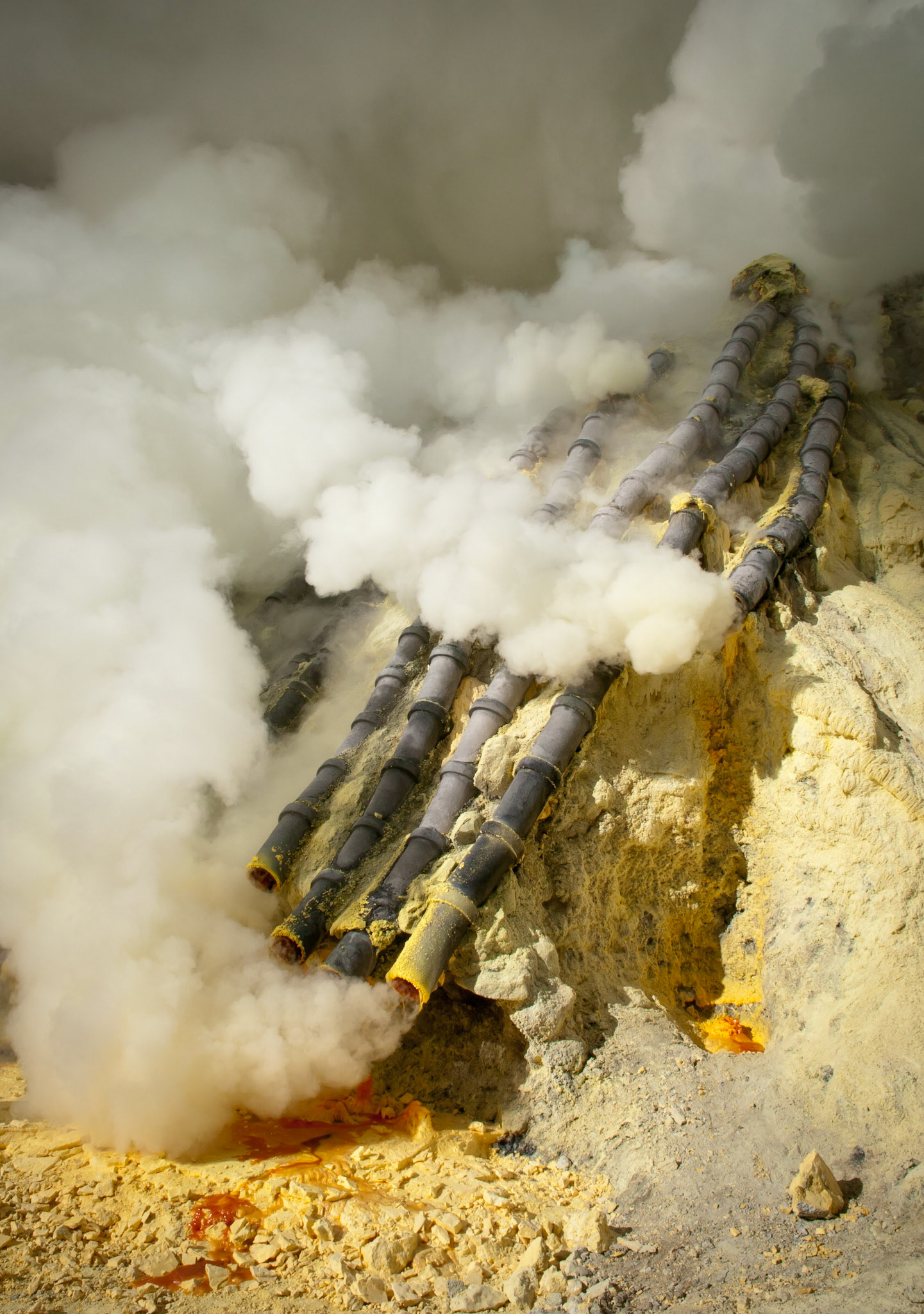 Condensation pipes at the mine (Kawah Ijen, Java, Indonesia)