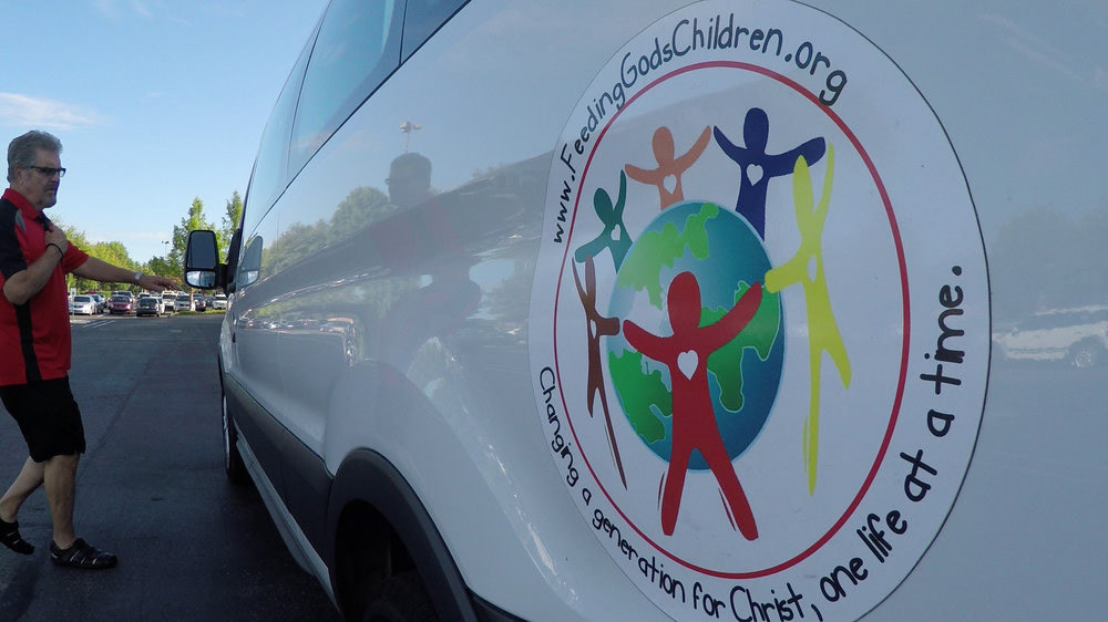 "Kiddish" Typeface (2012). Found on vinyl van decal. feedinggodschildren.org