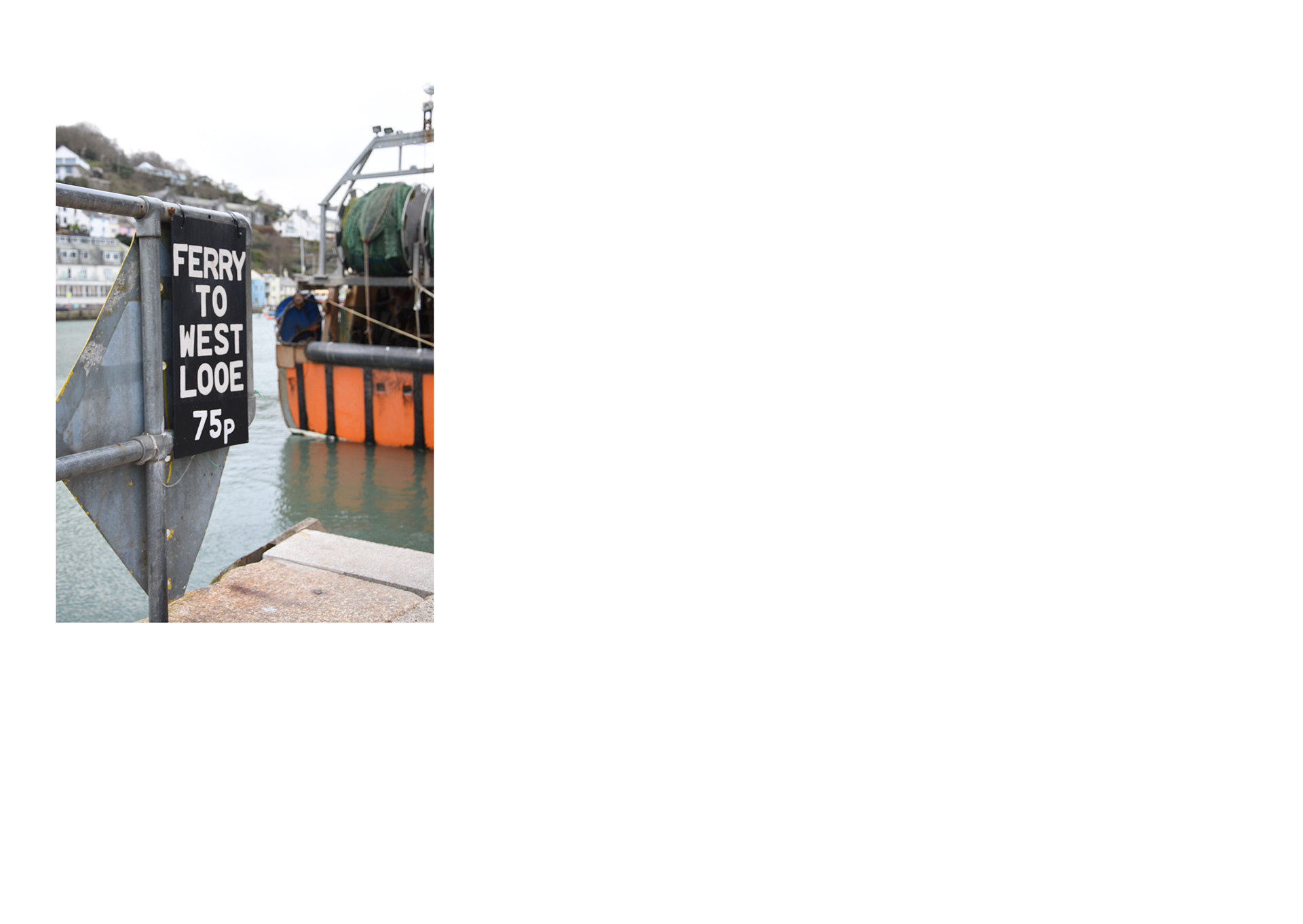 ferry to west looe sign next to river in the fishing town of looe in cornwall by freelance photographer melissa carne