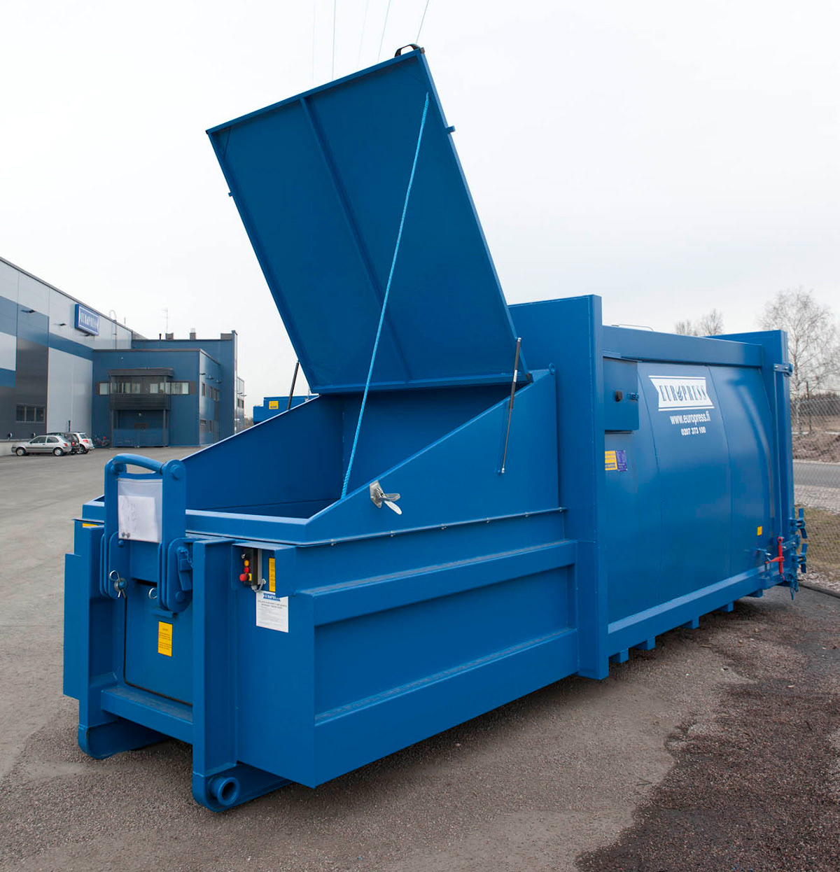 Client supplied photograph for the trash compactor