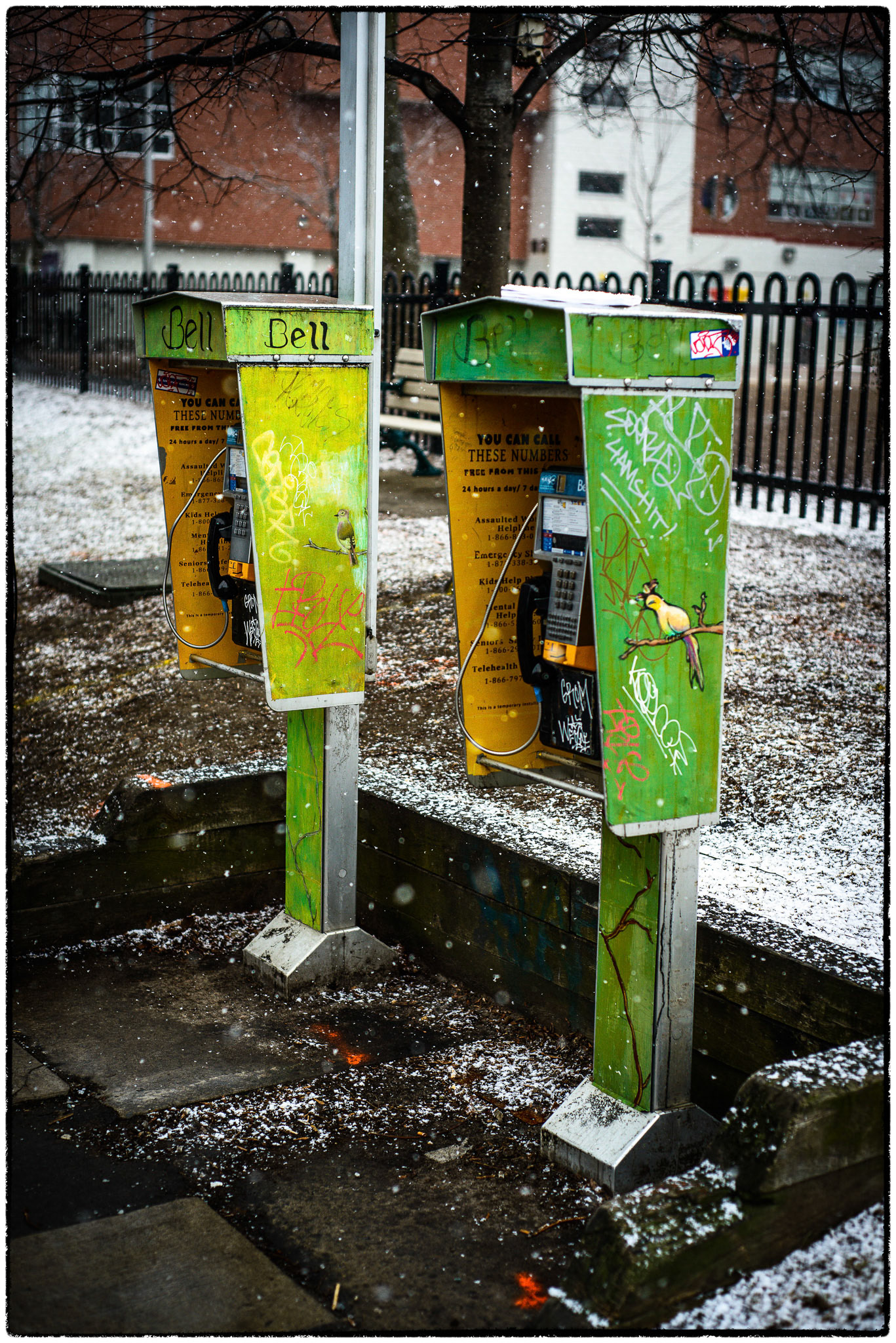 Two payphones in green rather than the usual blue