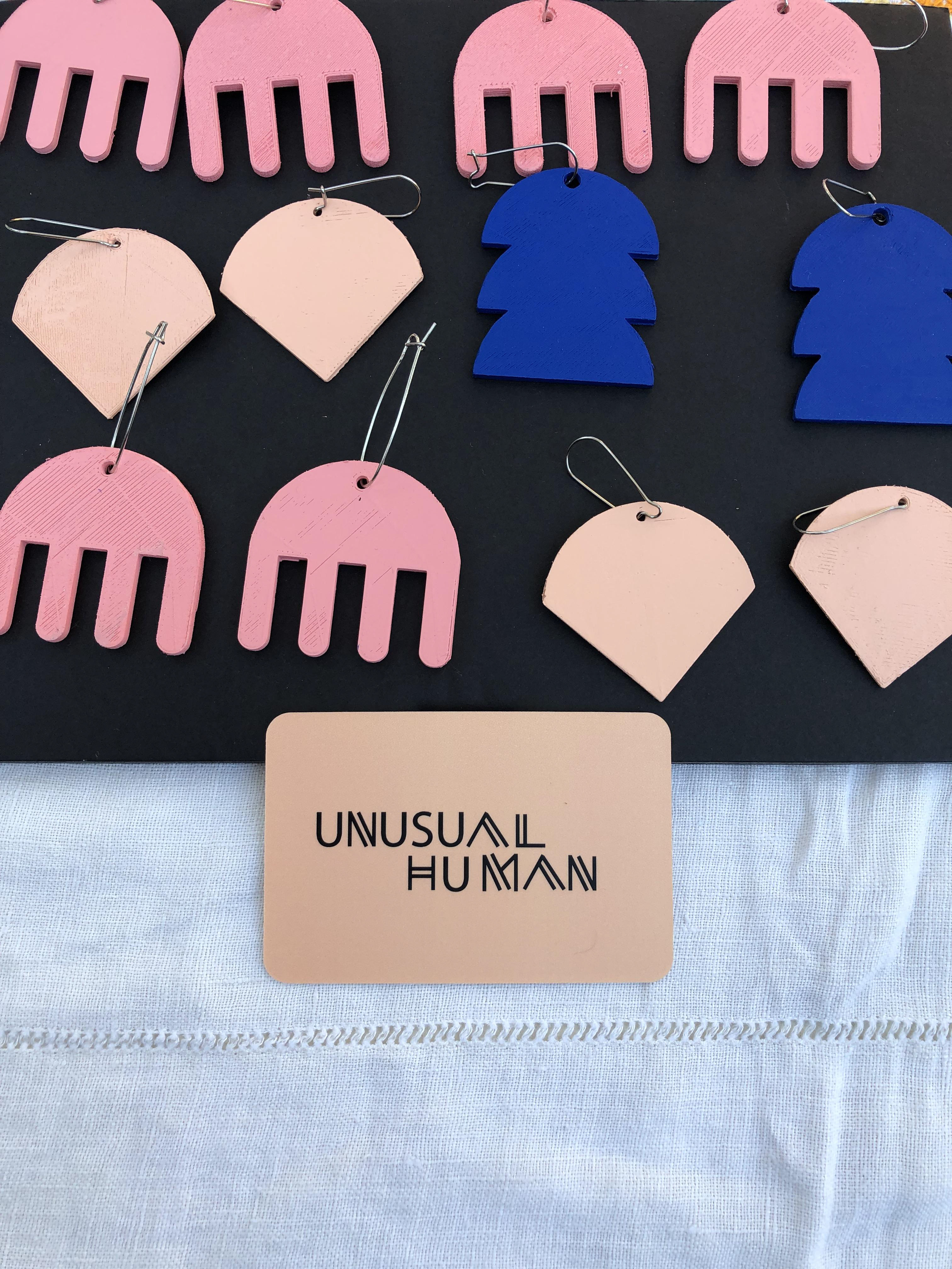 Jewelry designed, 3D printed and painted by me. Logo design also by me, in Adobe Illustrator